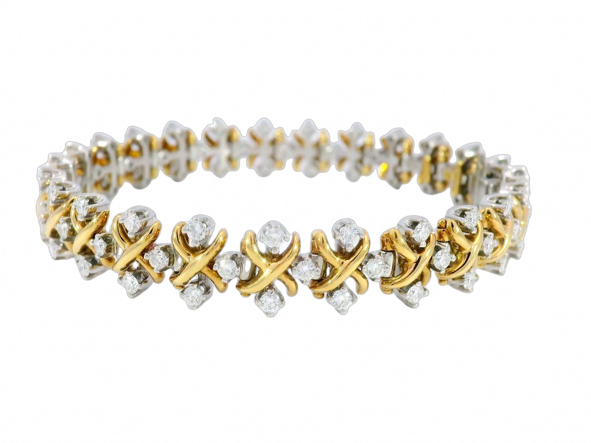 Tiffany & Co. Schlumberger Lynn Diamond Bracelet 18k Yellow Gold/Platinum 3CTW

The Tiffany & Co. Schlumberger Lynn Diamond Bracelet is a dazzling display of elegance and artistry. Designed by the legendary Jean Schlumberger, this bracelet brings