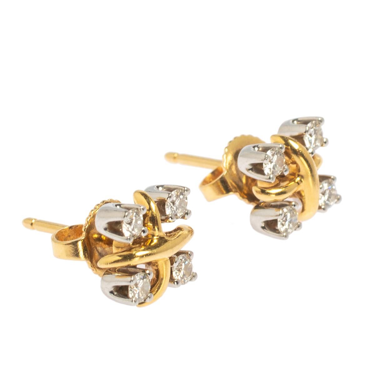 Jean Schlumberger, much like his other iconic designs, gifts us these lovely Tiffany & Co. stud earrings that have been beautifully crafted from 18k yellow gold and platinum and designed with four diamonds placed in a four-prong setting. They carry