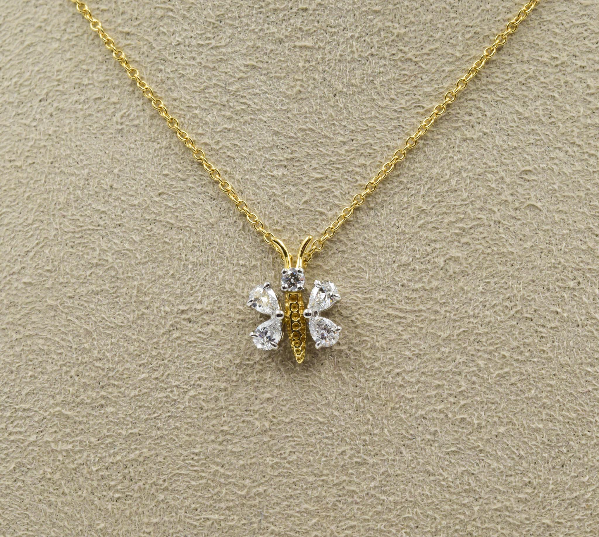 This is a previously owned Tiffany & Co necklace known as the Lynn Pendant within the Schlumberger collection. This is a beautiful piece which can be worn in various styles.  The pendant is in 18k yellow gold and platinum.  There are four round