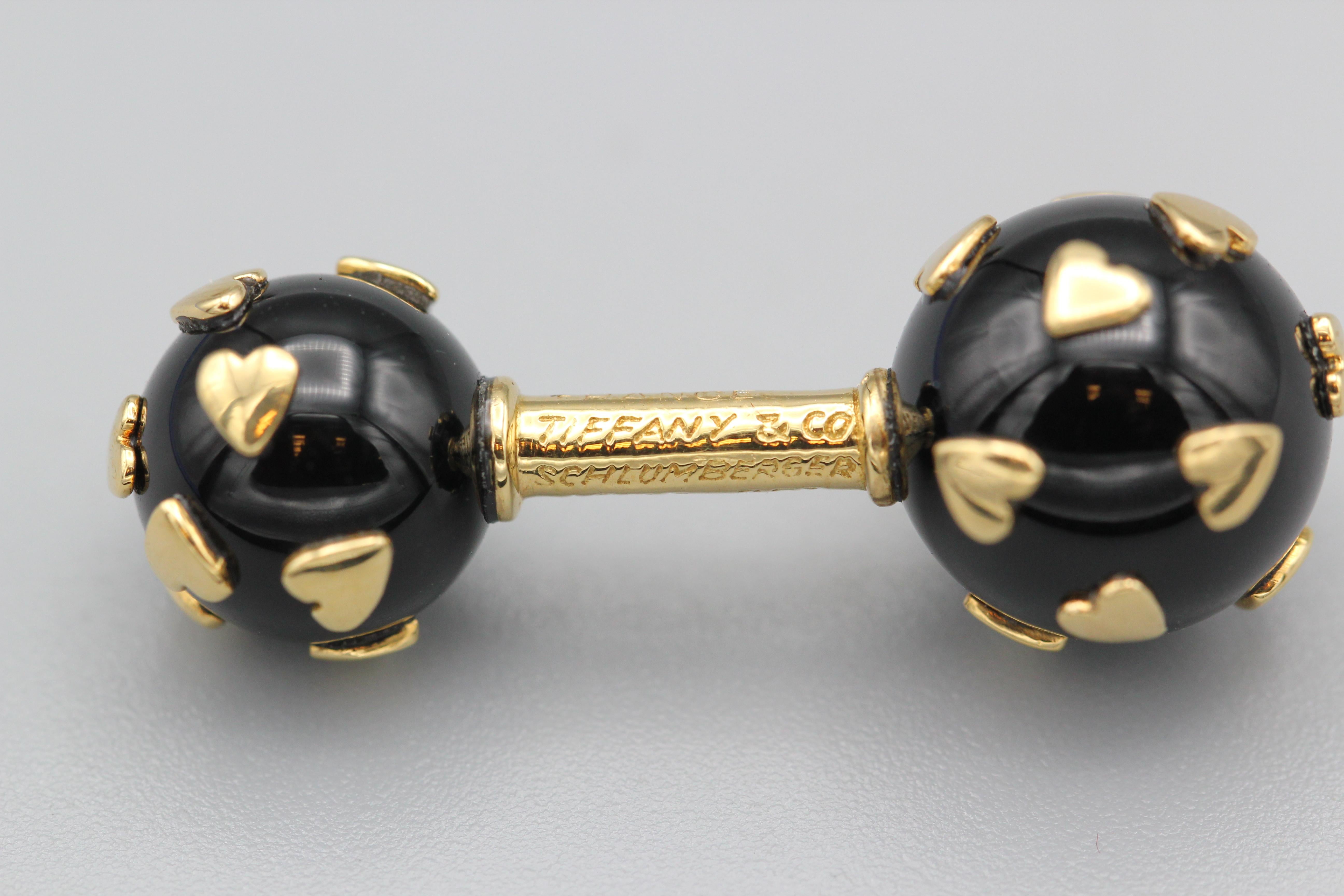 Tiffany & Co. Schlumberger Boutons de manchette Dumbbell en or 18 carats et onyx à motif de cœur Excellent état - En vente à New York, NY
