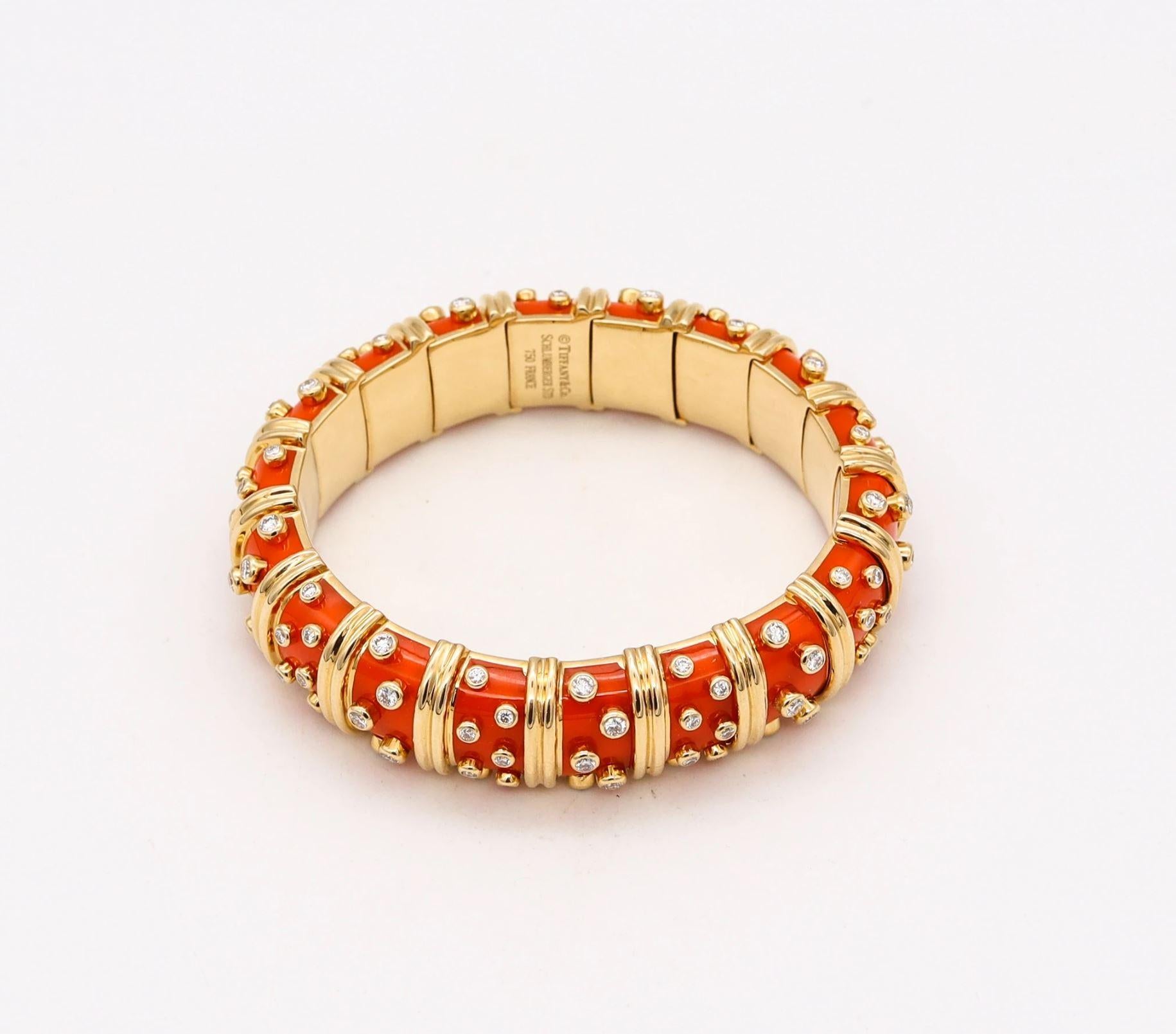Enamel bracelet designed by Jean Schlumberger for Tiffany & Co.

Beautiful and iconic piece, made in Paris France at the atelier of Schlumberger for the Tiffany studios. Designed as a orangerie paillonné hinged bangle bracelet, crafted with