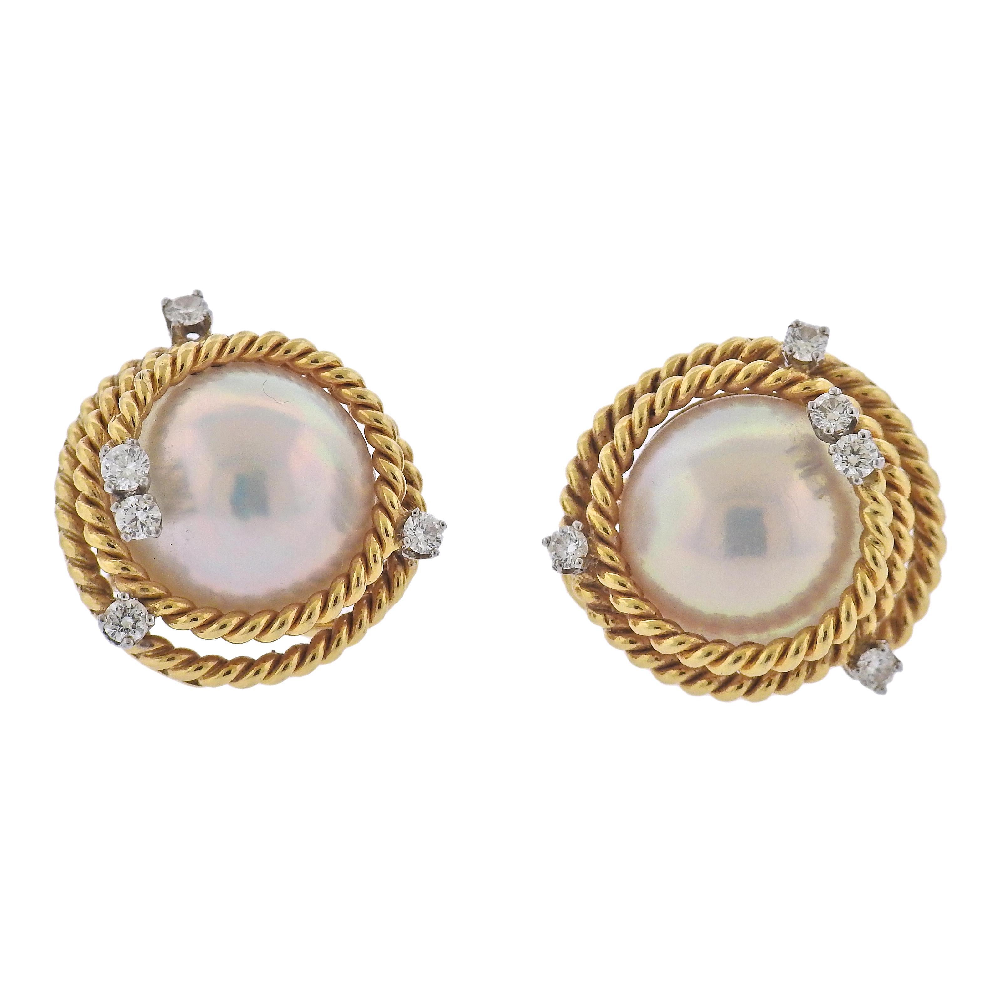 Pair of 18k gold and platinum rope earrings by Jean Schlumberger for Tiffany & Co, with 14.5mm pearls and approx. 0.55ctw in G/VS diamonds

MATERIAL: 18k Gold / Platinum
GEMSTONES: Diamond, Pearl
DIMENSIONS: Earrings are 21mm in diameter.
WEIGHT: