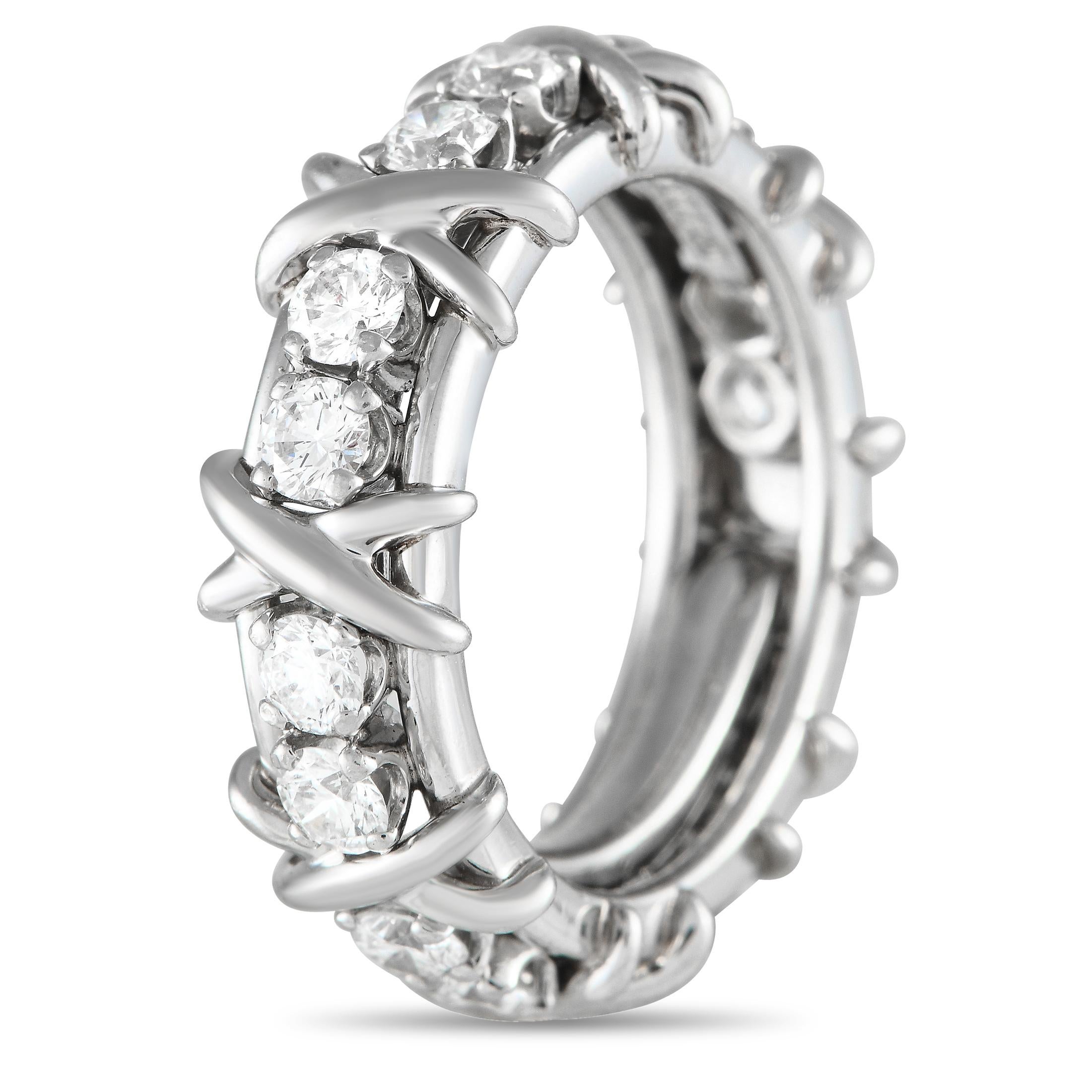 This Tiffany & Co. Schlumberger ring offers an exciting twist on tradition. This exquisite piece pairs Diamonds with a total weight of 1.14 carats with the collections signature cross-stitch motif. Crafted from shimmering Platinum, it features a 5mm