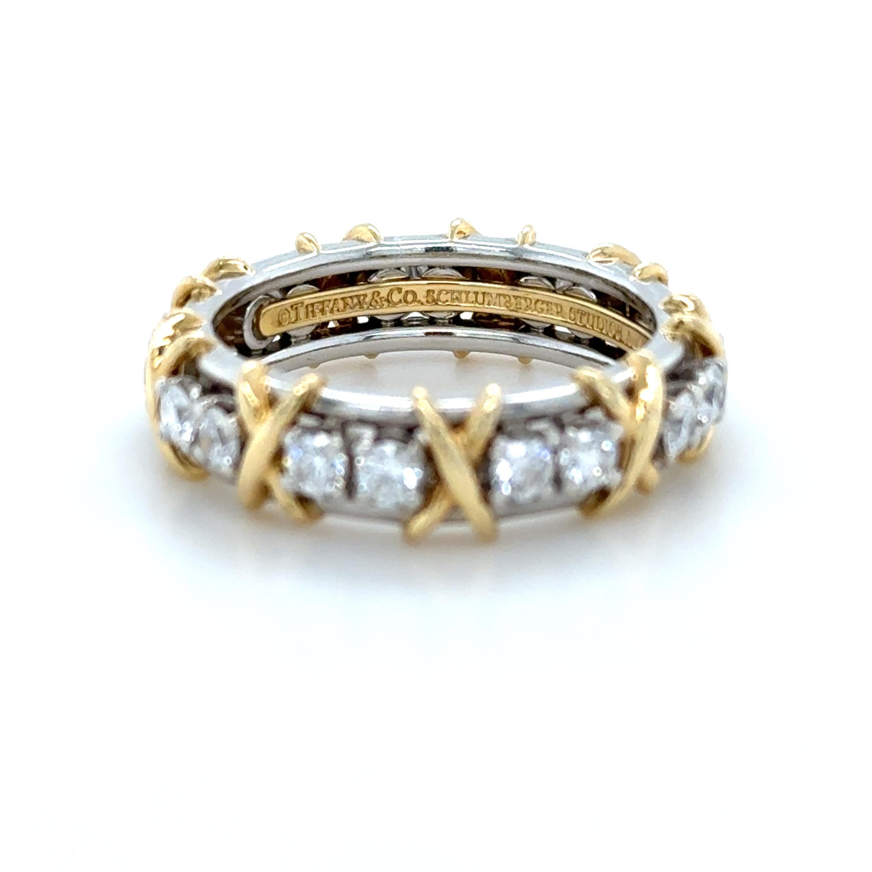 Contemporary Tiffany & Co., Schlumberger, Platinum and Yellow Gold 16 Stone Diamond X Band