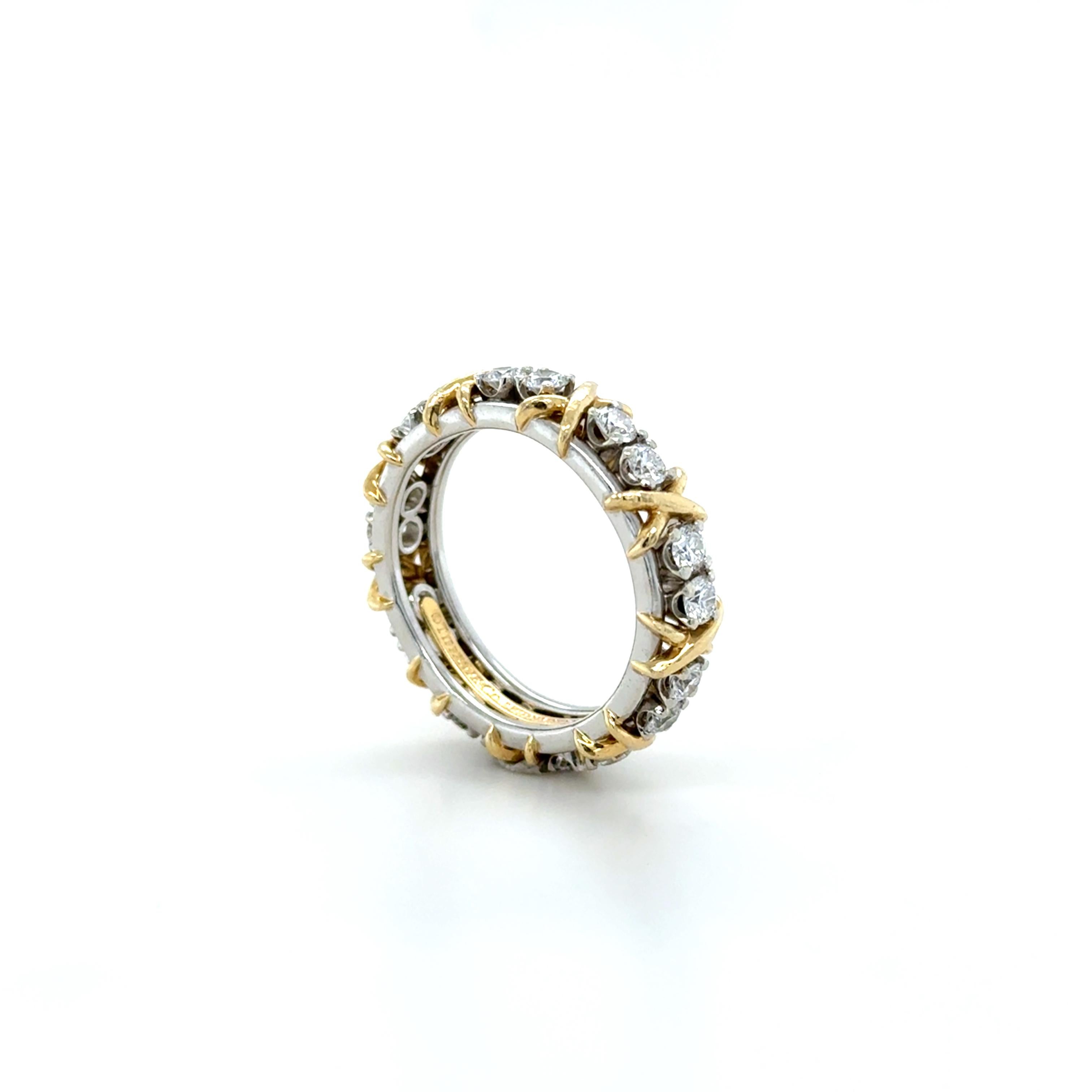 Brilliant Cut Tiffany & Co., Schlumberger, Platinum and Yellow Gold 16 Stone Diamond X Band
