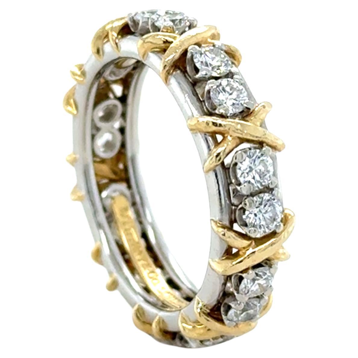 Tiffany & Co. Schlumberger, platine et or jaune avec 16 pierres en forme de X