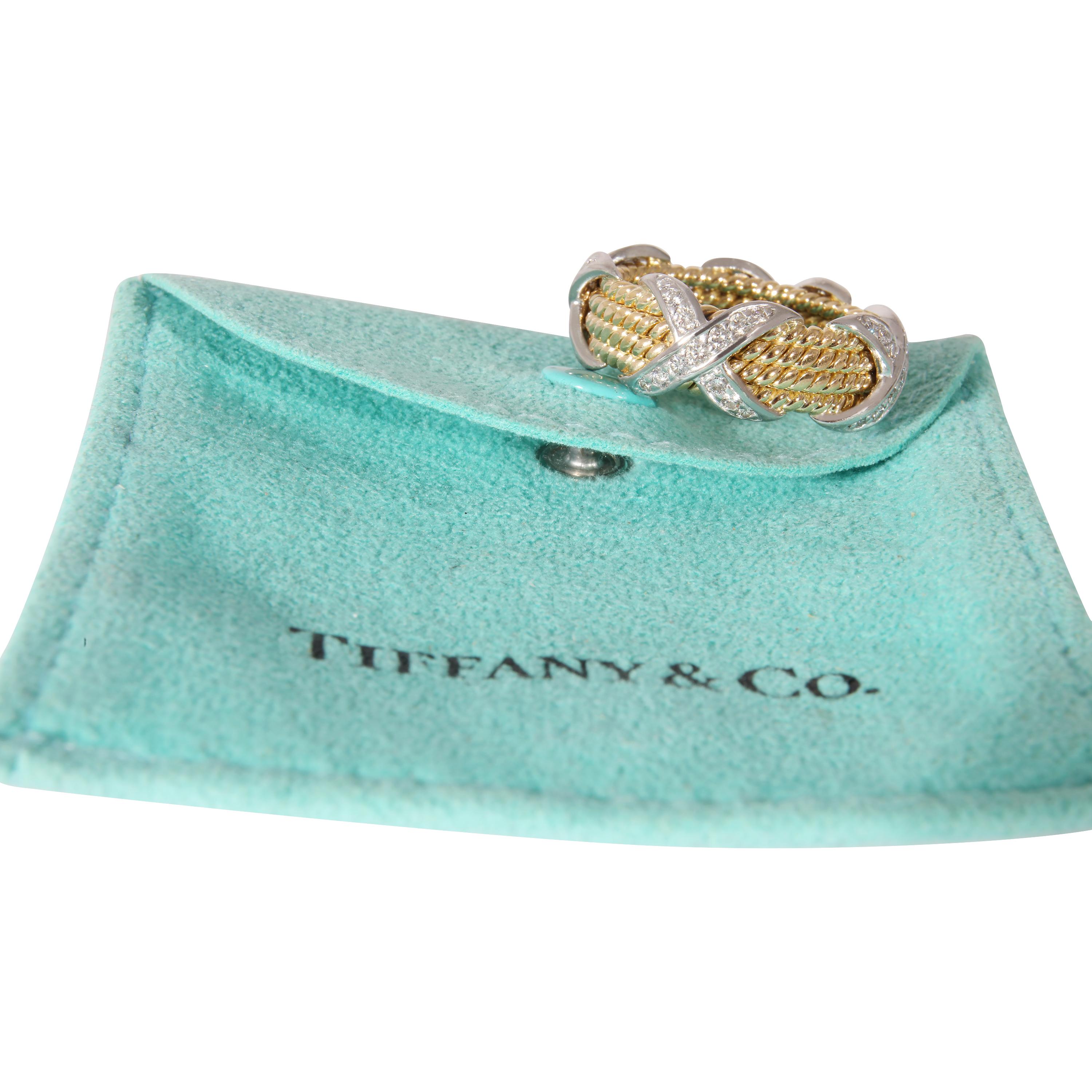 Tiffany & Co. Schlumberger Ring in 18k Yellow Gold/Platinum 0.54 CTW

PRIMARY DETAILS
SKU: 133662
Listing Title: Tiffany & Co. Schlumberger Ring in 18k Yellow Gold/Platinum 0.54 CTW
Condition Description: “I want to capture the irregularity of the