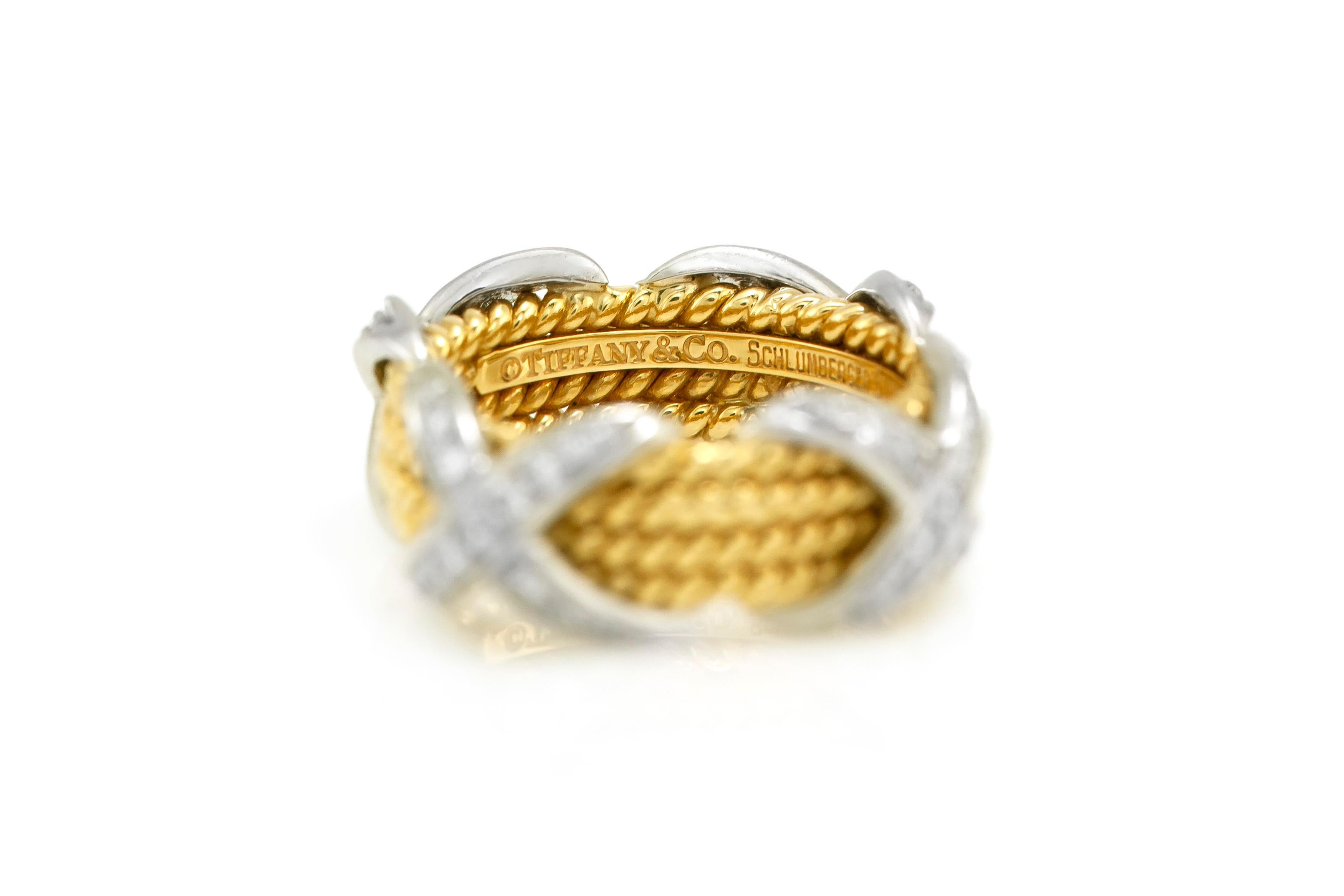 The ring is finely crafted in 18k yellow gold with diamonds weighing approximately total of 1.25 carat.

Sign Tiffany & Co