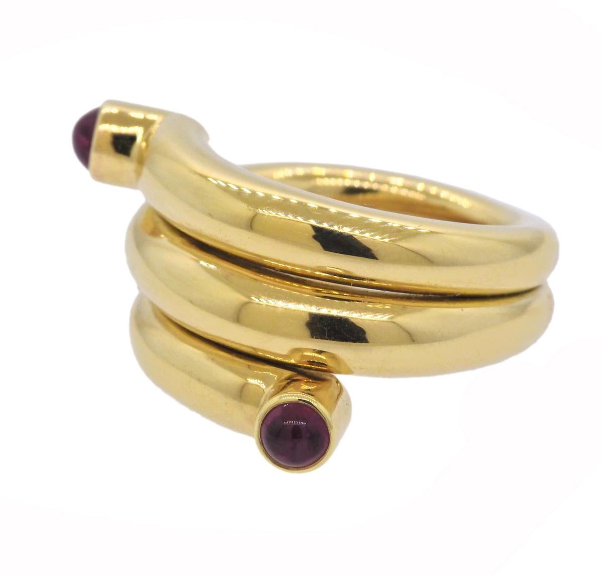 Tiffany & Co 18k gold wrap ring, crafted by Jean Schlumberger, set with two rubies. Ring size - 5.5, ring top is 14mm wide. Marked 750, Schlumberger, Tiffany & Co.