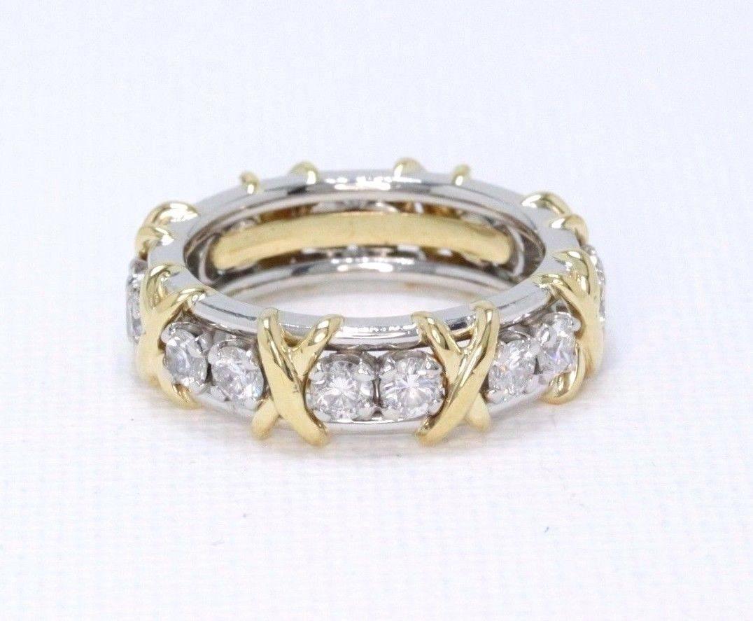 Tiffany & Co.
Style:  SCHLUMBERGER SIXTEEN STONE RING
Sku Number:  11715931
Metal:  18KT Yellow Gold & Platinum PT950
Size:  5 - not sizable
Total Carat Weight:  1.14 TCW
Diamond Shape:  Round Brilliant Diamonds ( 16 Stones )
Diamond Color &