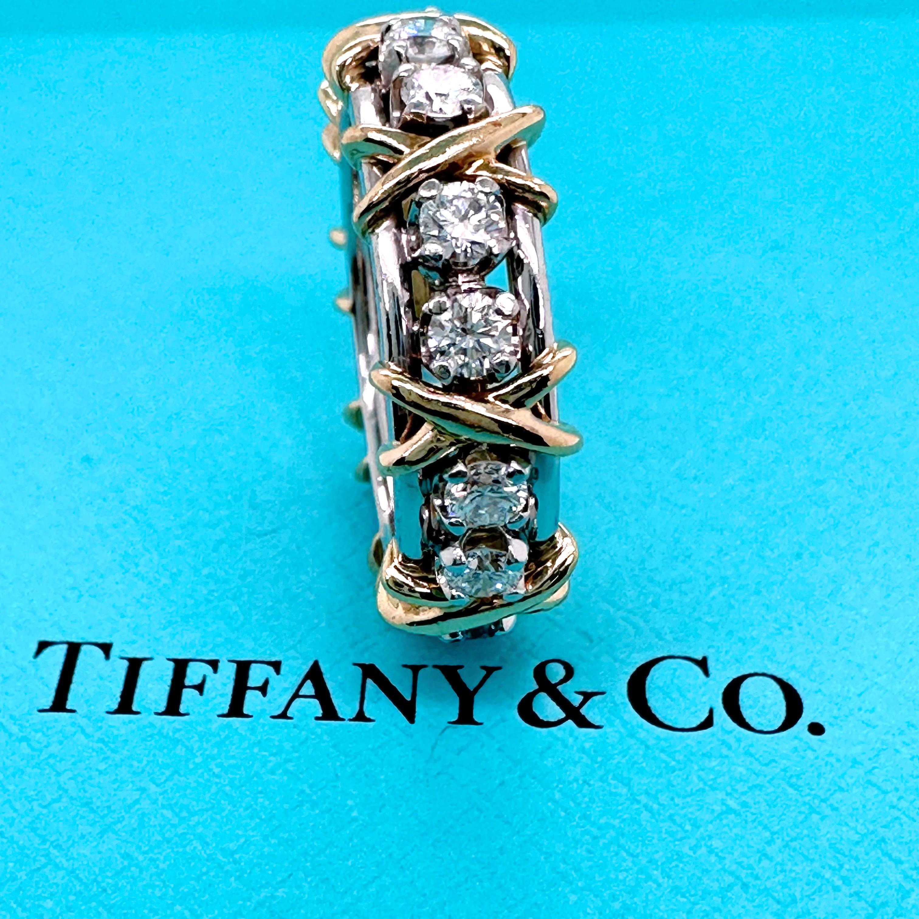 Tiffany & Co. Schlumberger Sixteen Stone Diamond Band Ring
Style:  Band
Ref. number:  600099365
Metal:  Platinum PT950 & 18Kt Yellow Gold
Size:  7.5
Measurements:  11 MM
Main Diamond:  16 Round Diamonds 1.14 tcw
Hallmark:  ©TIFFANY&CO. SCHLUMBERGER