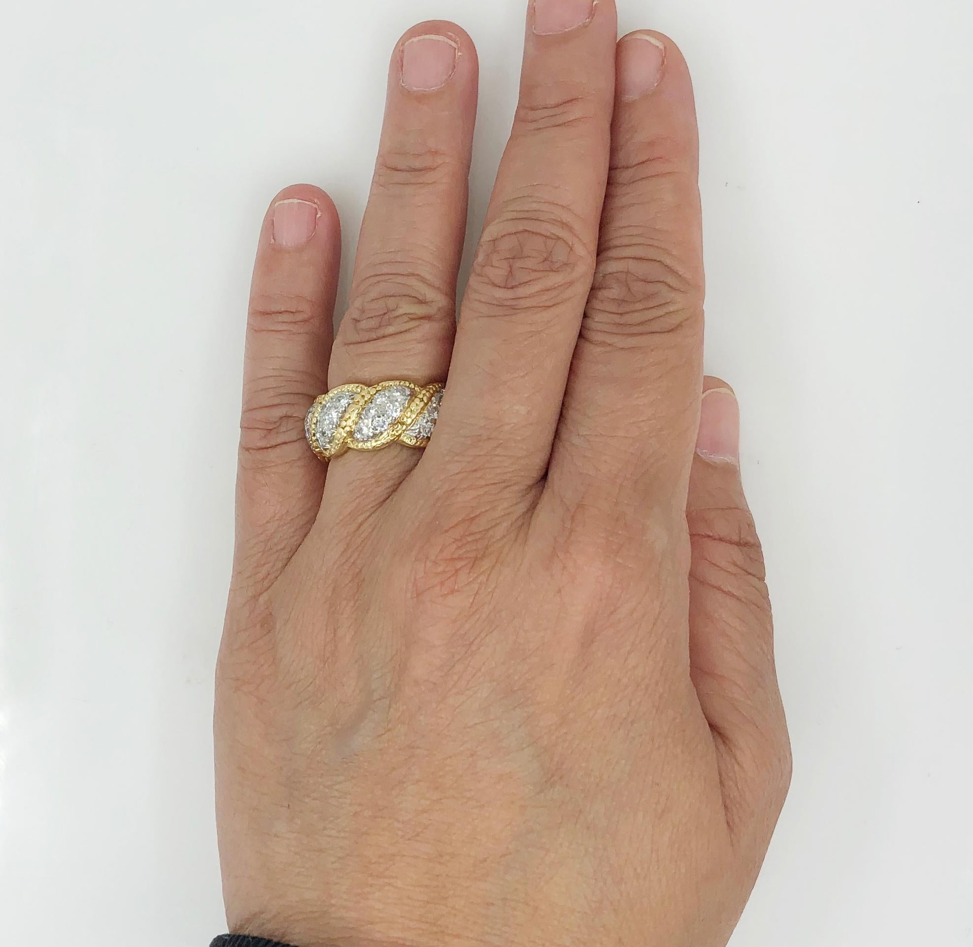 TIFFANY & Co. Schlumberger Studio Diamond Ring.
Crafted in 18k yellow gold and platinum wedding ring, set with round brilliant-cut diamonds, Tiffany & Co
ring size 6.25 and 0.25″ wide
Signed “Tiffany & Co. Schlumberger Studios”