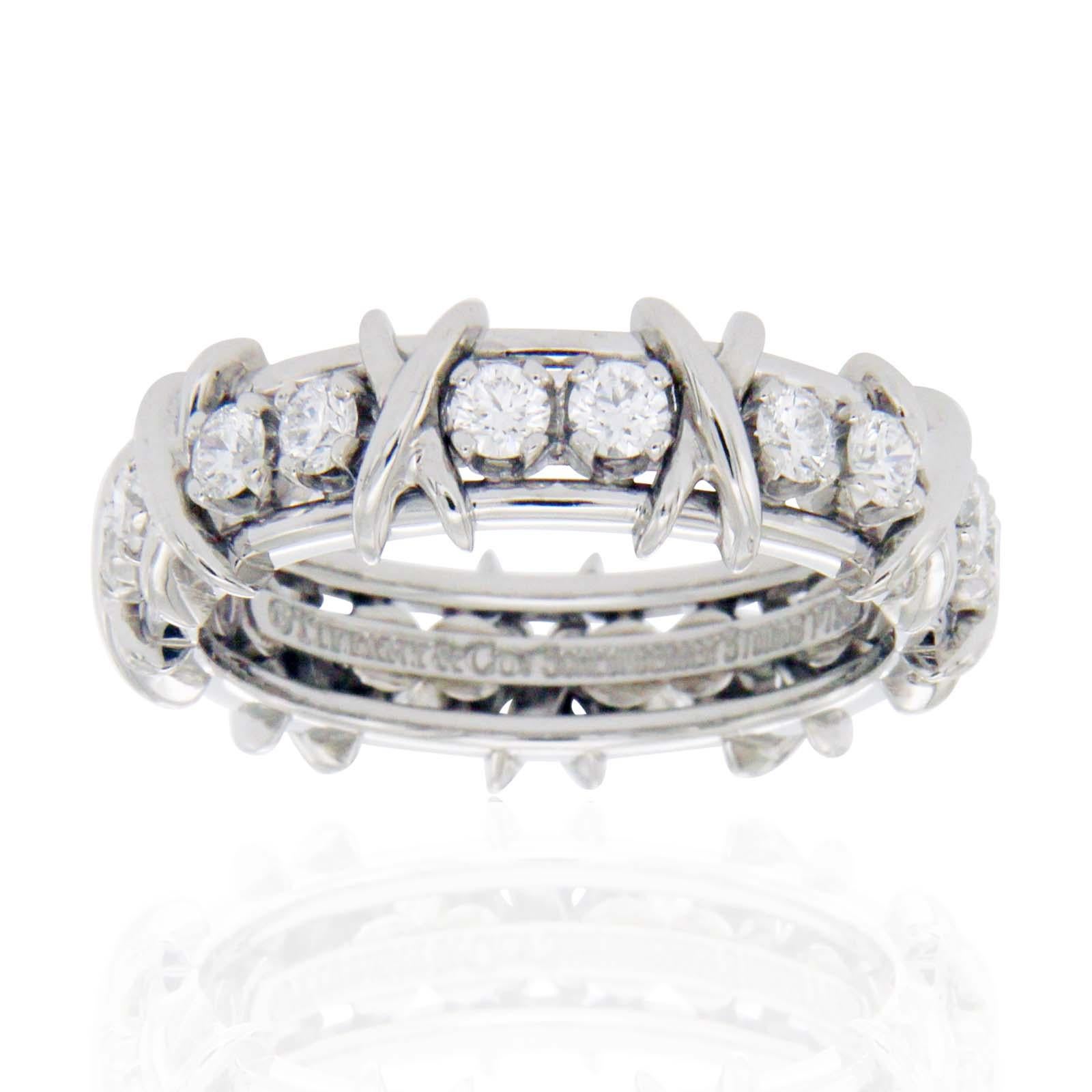 Type: Ring
Top: 7.5 mm
Band Width: 7.5 mm
Metal: Platinum
Metal Purity: 950
Size:10
Hallmarks: Tiffany & Co Schlumberger Studios P950
Total Weight: 12.8 Grams
Stone Type: Diamonds
Condition: Pre Owned
Stock Number: U314