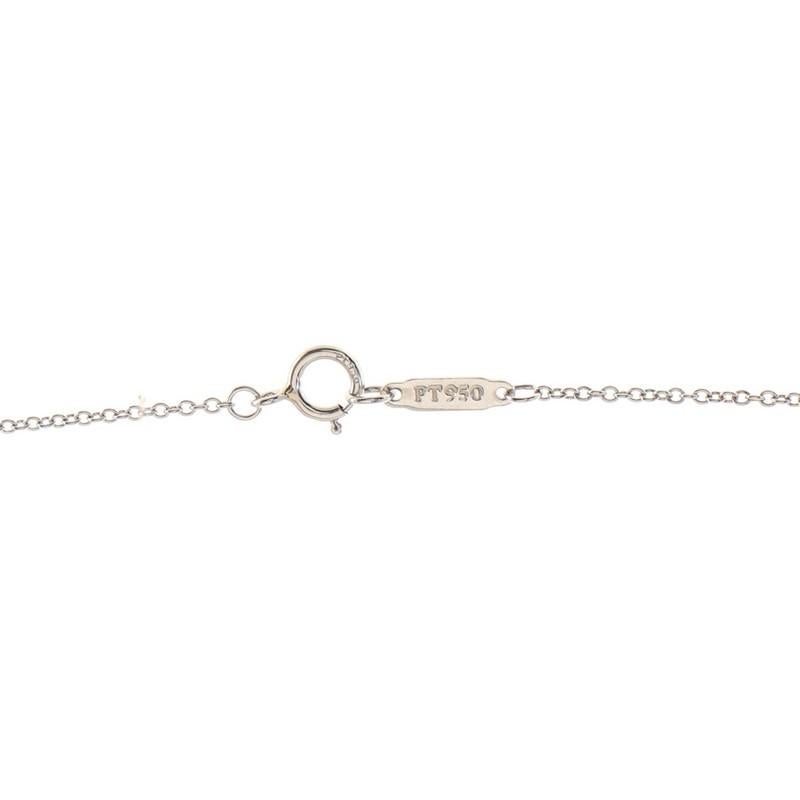 Round Cut Tiffany & Co. Schlumberger Ten Stone Cross Pendant Necklace Platinum and Diamond