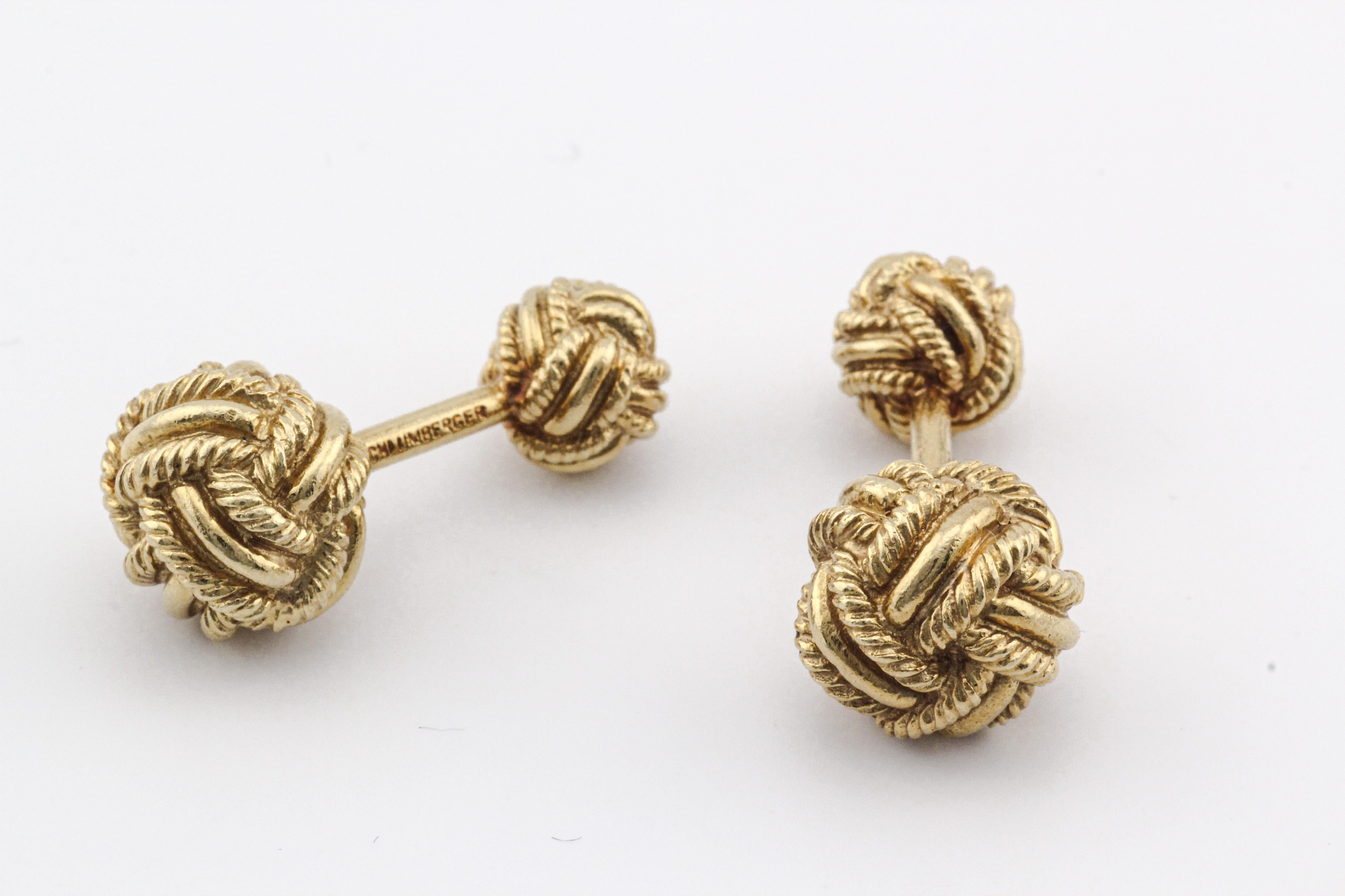 Introducing the Tiffany & Co. Schlumberger 18K Yellow Gold Rope Knot Cufflinks and Studs Set—an exquisite ensemble that encapsulates the essence of timeless elegance and Schlumberger's iconic design aesthetic. Crafted with meticulous precision, this
