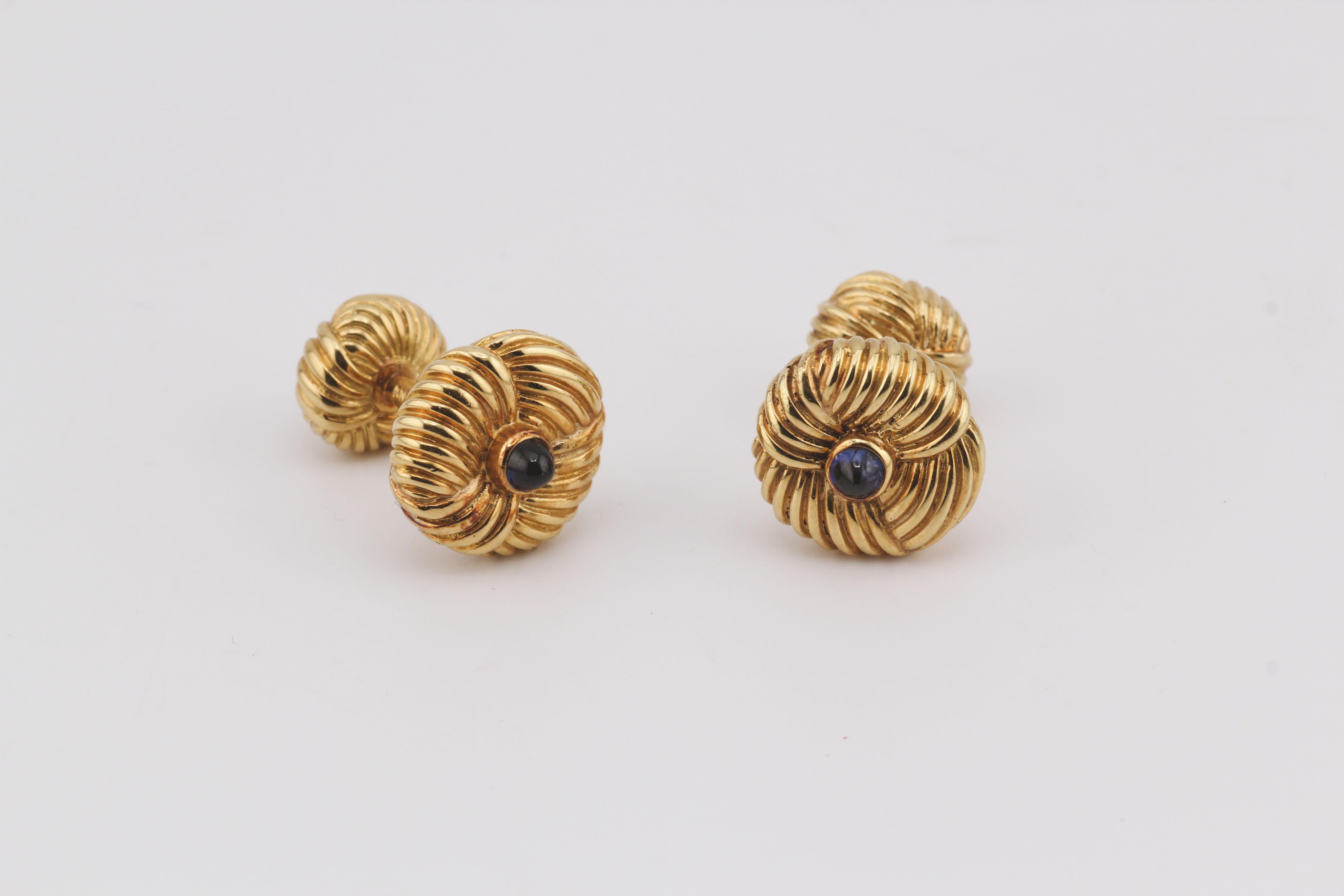 Step back in time to the glamorous 1970s with the Tiffany & Co. Schlumberger Vintage Sapphire 18k Yellow Gold Cufflinks, a true embodiment of opulence and enduring style. Crafted by the legendary designer Jean Schlumberger for Tiffany & Co., these