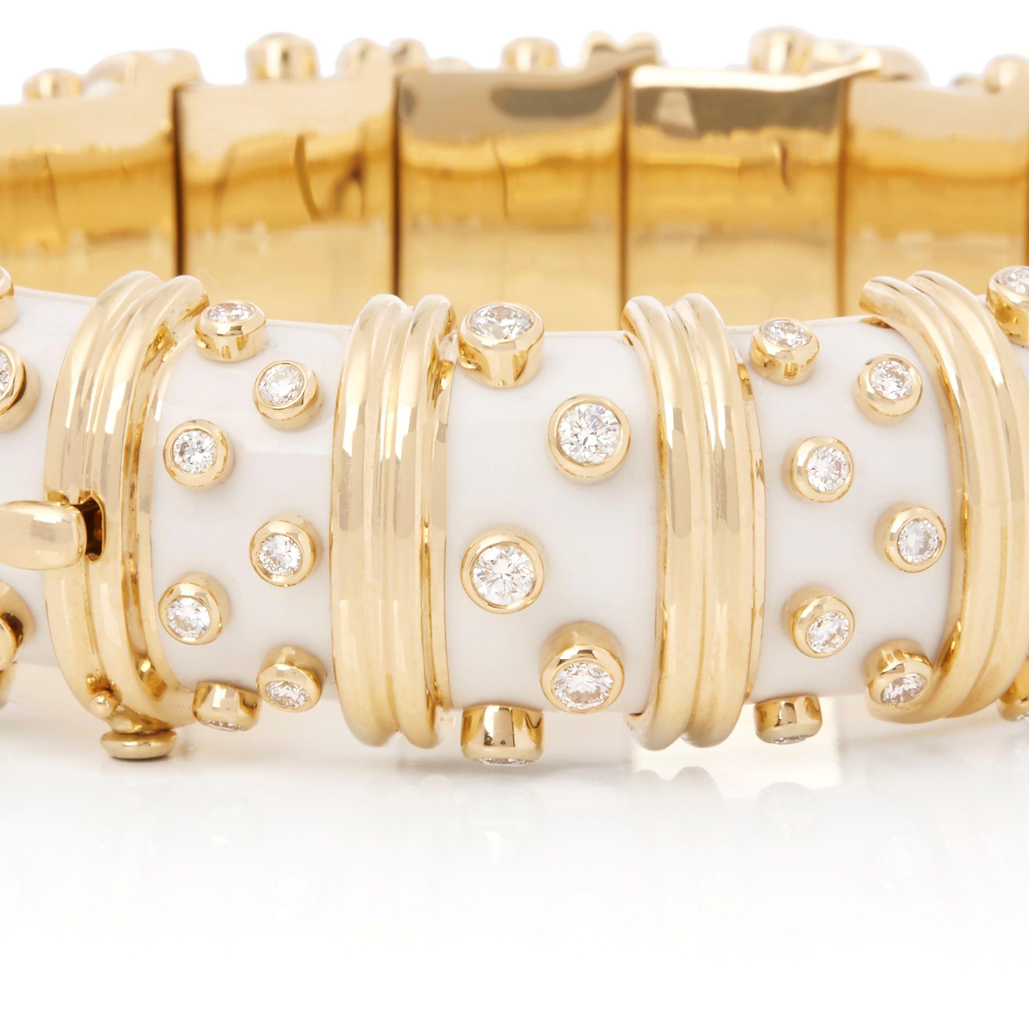 A DIAMOND AND WHITE ENAMEL BANGLE BRACELET, BY JEAN SCHLUMBERGER, TIFFANY & CO.
Designed as a white paillonné enamel hinged bangle, decorated with collet-set diamonds and sculpted gold vertical bands, 6 3/4 ins. inner diameter, mounted in platinum