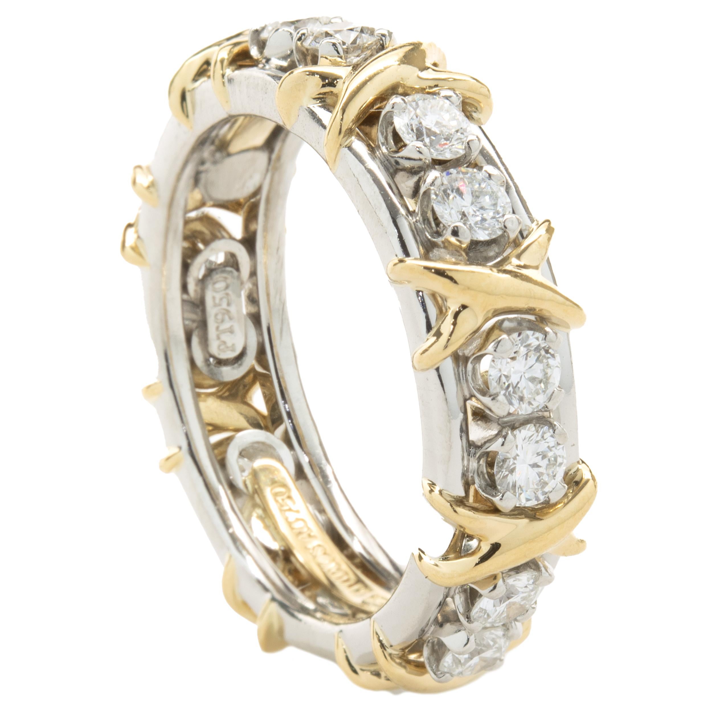 Designer: Tiffany & Co. / Schlumberger
Material: 18K yellow gold
Diamond: 16 round brilliant cut  = 1.14cttw
Color: F / G
Clarity: VS1-2
Dimensions: band measures 6.8mm wide
Size: 7
Weight: 9.65 grams