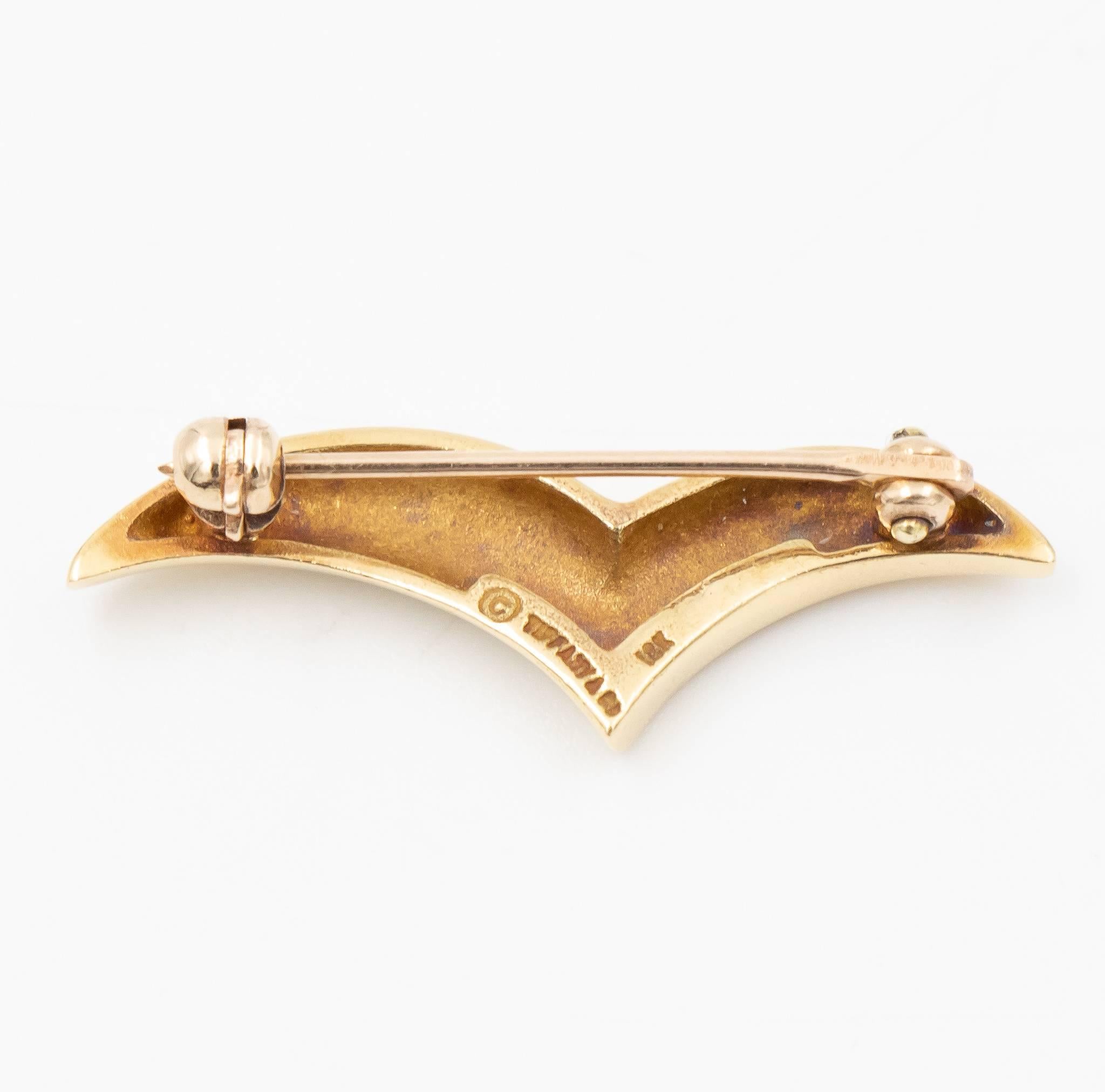 This V Brooch is known as the Seagull V Brooch by Tiffany & Co.  This was recently traded in to our store and is a unique, classic and simple design which can be worn for an every-day brooch style.  This is a great Tiffany & Co. icon and please let