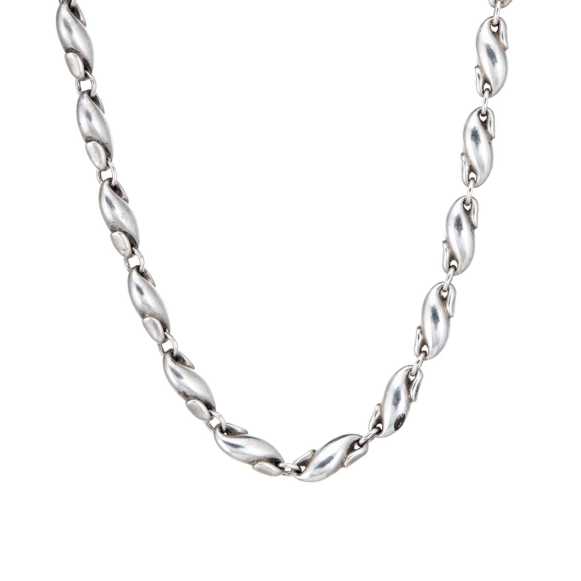 Stylish and finely detailed estate Tiffany & Co 'seahorse' link necklace, crafted in sterling silver.  

Designed by the famed Elsa Peretti the necklace features stylized 'seahorse' links. Measuring 16 inches in length the necklace sits nicely at