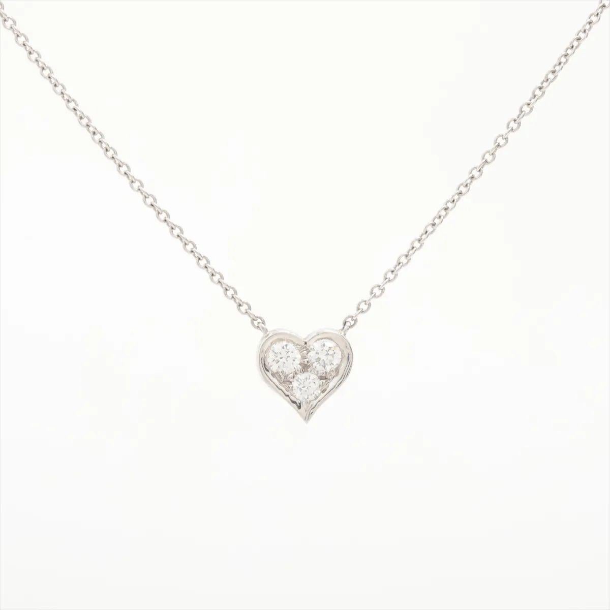 The Tiffany & Co. Sentimental Heart Diamond Necklace in platinum is a breathtaking embodiment of timeless luxury and delicate craftsmanship. At its center lies a beautifully sculpted heart pendant, meticulously polished to a luminous finish and