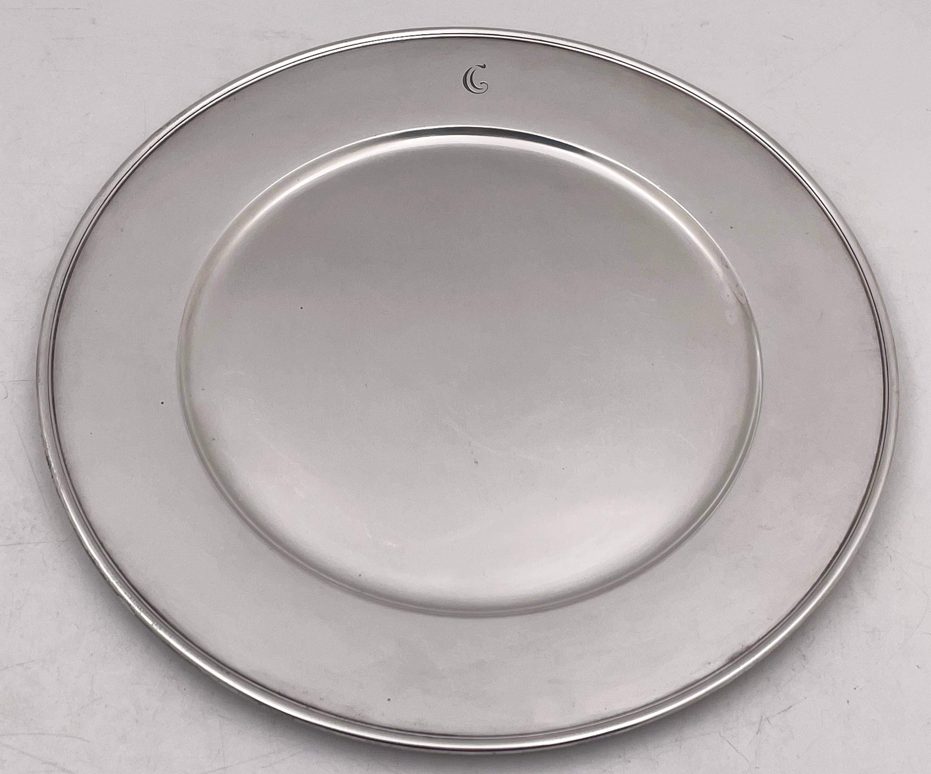 Set of 3 Tiffany & Co. sterling silver chargers or dinner plates in pattern number 18250 from 1912 and in Art Deco style with an elegant, geometric design. They measure 11'' in diameter by 5/8'' in height, weigh 52.5 troy ounces, and bear hallmarks