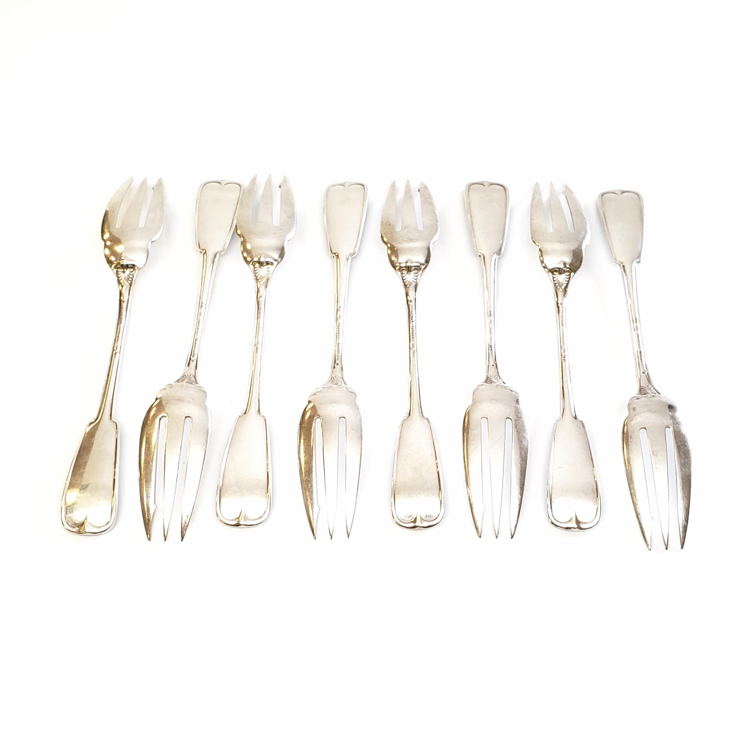 Set of 8 antique sterling silver pie forks by Tiffany & Co. in the Palm pattern.

The Palm pattern was designed by Edward C. Moore and introduced in 1871. It is a simple and elegant pattern inspired by the natural world. These pie forks feature 1
