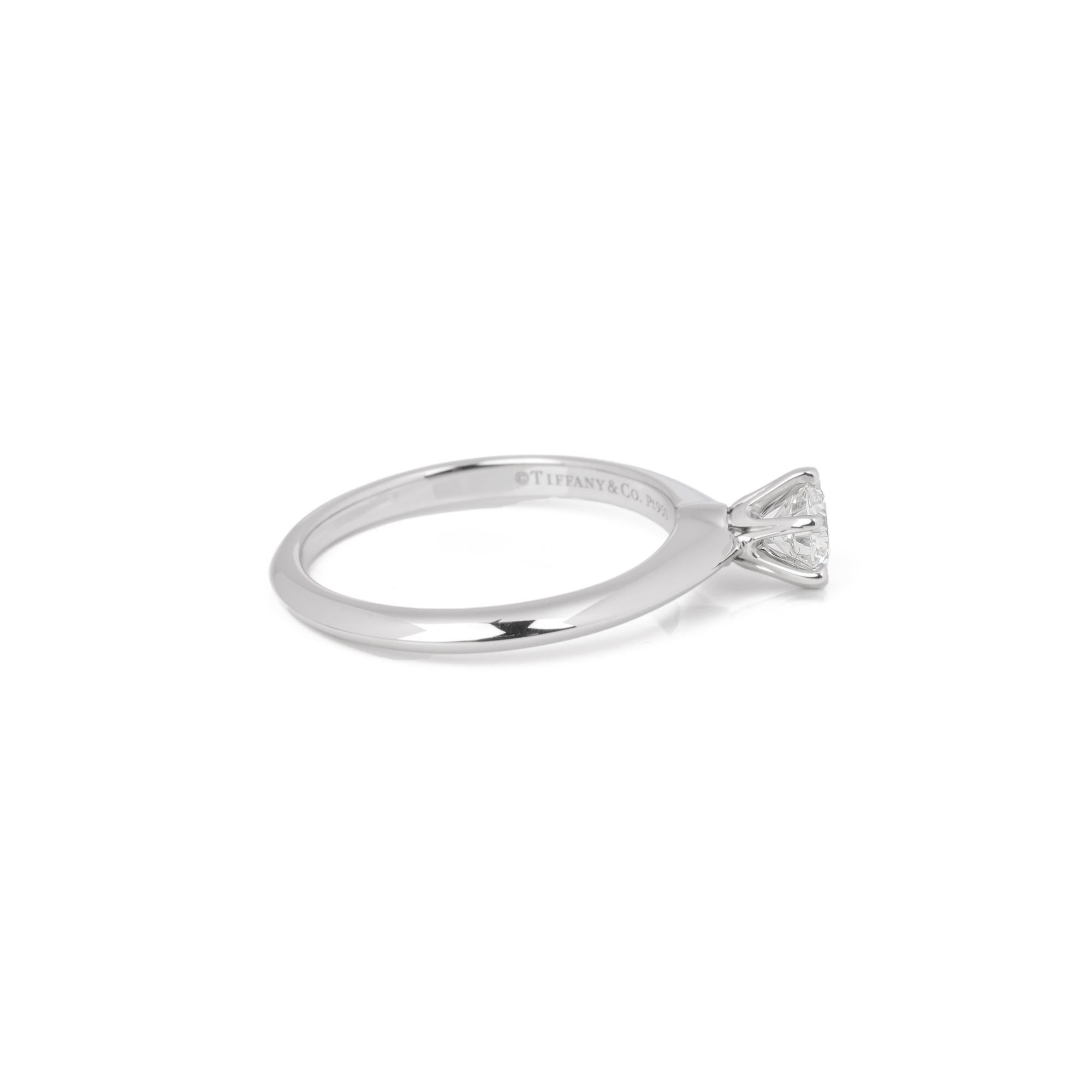 ITEM CONDITION	Excellent
MANUFACTURER	Tiffany & Co.
MODEL	Tiffany Setting
GENDER	Women's
ACCOMPANIED BY	Box and certificate
UK RING SIZE	K
EU RING SIZE	50
US RING SIZE	5.25
BAND WIDTH	2mm
TOTAL WEIGHT	3.6g
PRIMARY STONE QUANTITY	1
PRIMARY STONE