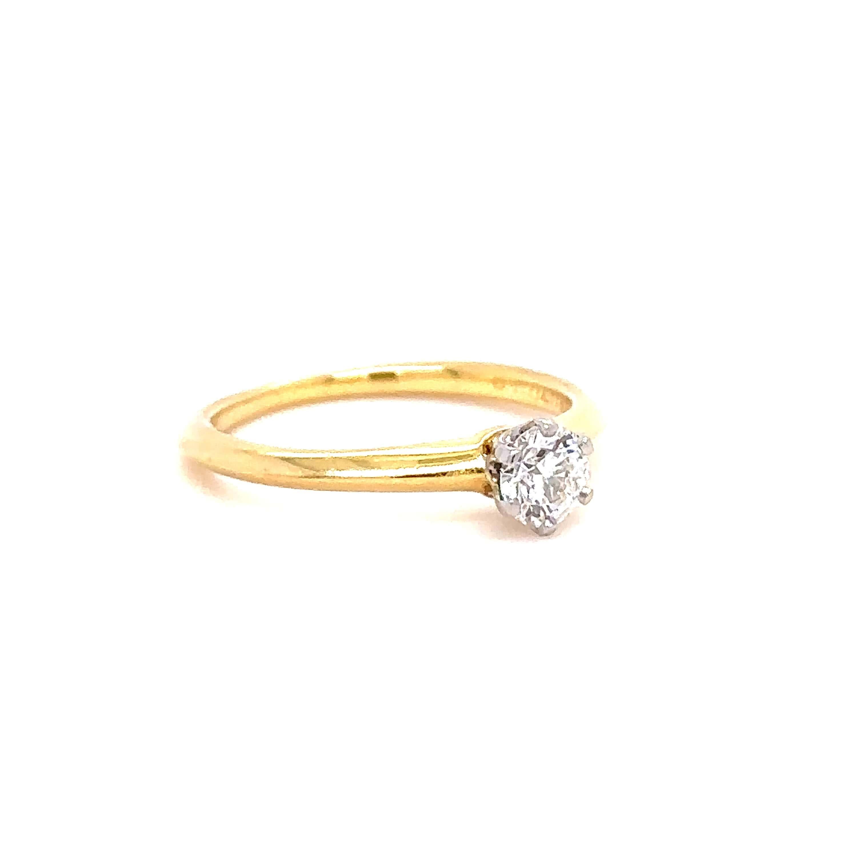 Unique features: 

The Tiffany Setting Engagement ring in 18k Yellow Gold. Set with a single round, brilliant cut diamond

Metal: 18k Yellow Gold
Carat: 0.33ct
Colour: F
Clarity:  VVS2
Cut: Round Brilliant
Weight: 2.37 grams
Engravings/Markings: