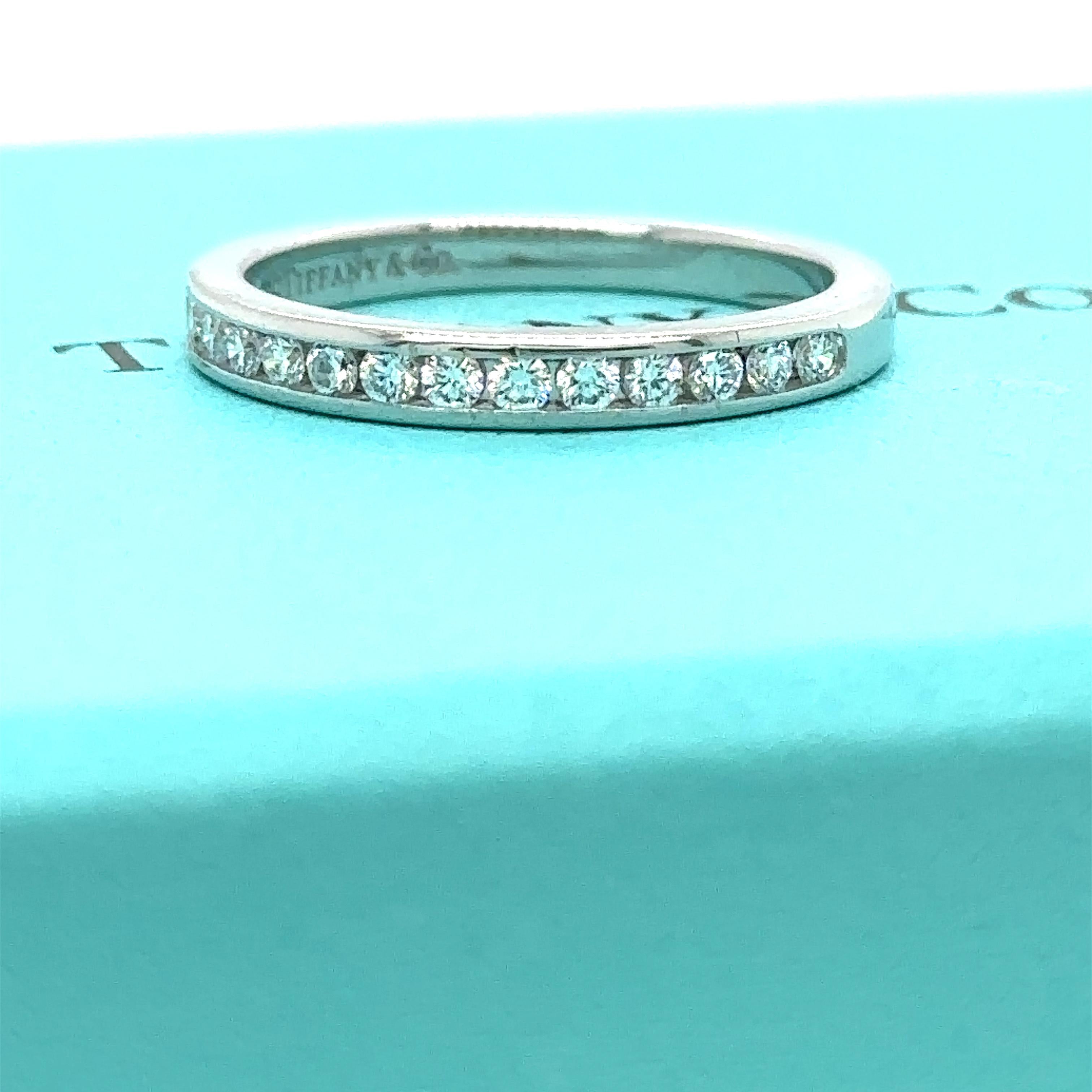 Unique features:

Tiffany & Co setting wedding band in platinum with a half circle of diamonds 2.5mm
Metal: 950 Platinum
Carat: 0.24ct
Colour: N/A
Clarity: N/A
Cut: Round Brilliant
Weight: 3.6 grams
Engravings/Markings: PT950 TIFFANY &