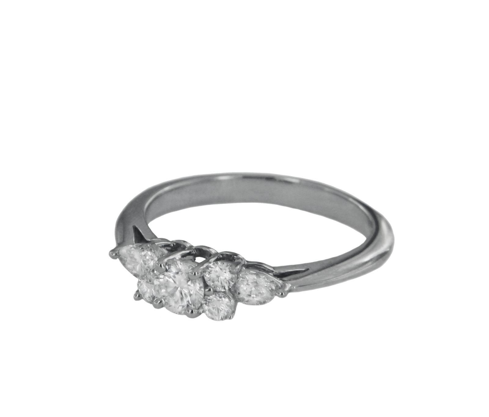 TIFFANY & CO. SEVEN STONE DIAMOND PLATINUM RING. 

-Mint condition
-Platinum
-Ring size: 5.5
-Width: 2-4.5mm
-Diamonds: 0.8
-Comes with Tiffany box.