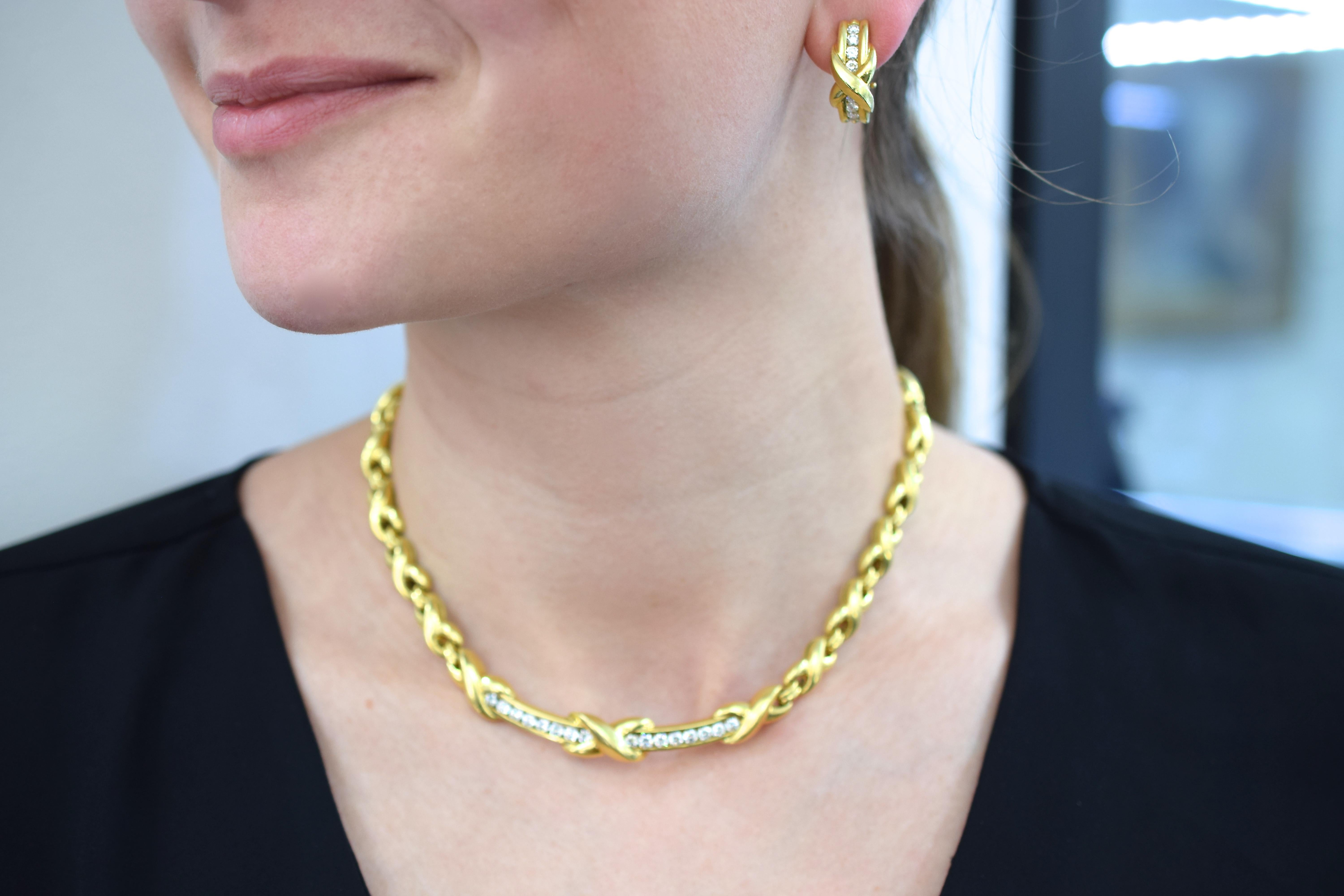 Tiffany and  Co 
X'-motif, ribbed link necklace with matching earrings 
Total weight of the diamonds is 3.40 carats 
Diamond  18k yellow gold, 

Signed Tiffany and Co. 
Measurements:
Necklace length is 17inches
Earrings: 7/8x1/4 inches