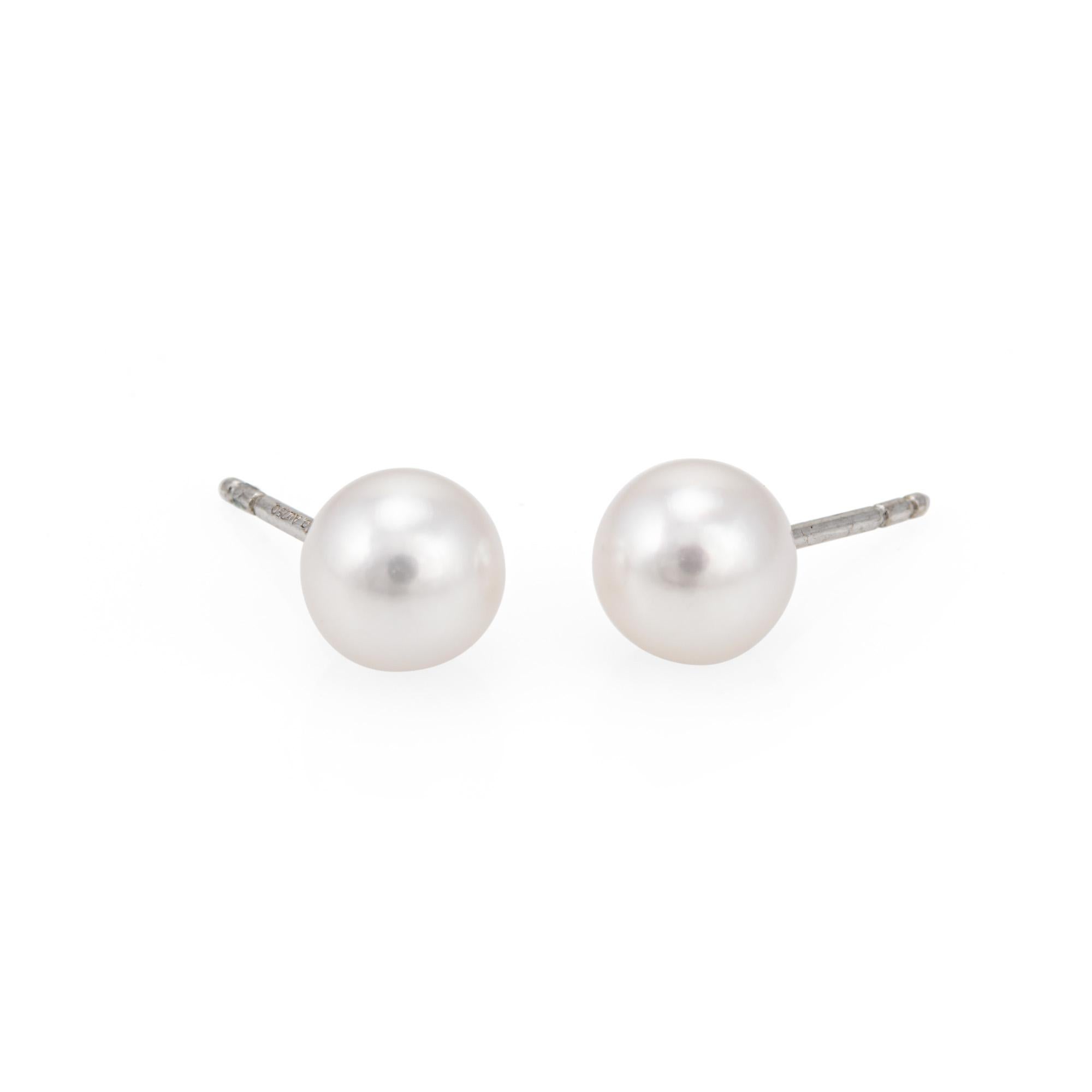 Pair of estate Tiffany & Co signature pearl earrings crafted in 18k white gold. 

Two Akoya cultured pearls measure 7mm. The pearls are in very good condition and free of cracks or chips, exhibiting excellent luster and rose overtones. 

The stylish