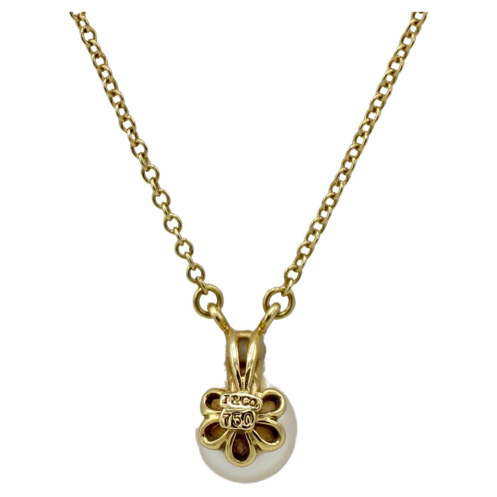 Tiffany & Co. Signature Pearl & Natural Diamond Pendant Drop Necklace 18K Yellow Gold
Metal: 18k yellow gold
Weight: 2.3 grams
Pearl: 6.5mm
Diamond: 0.5 CT round F VS natural diamond
Chain: 16 inches
Signed: Tiffany & Co. 750
Retail: $1,050 USD