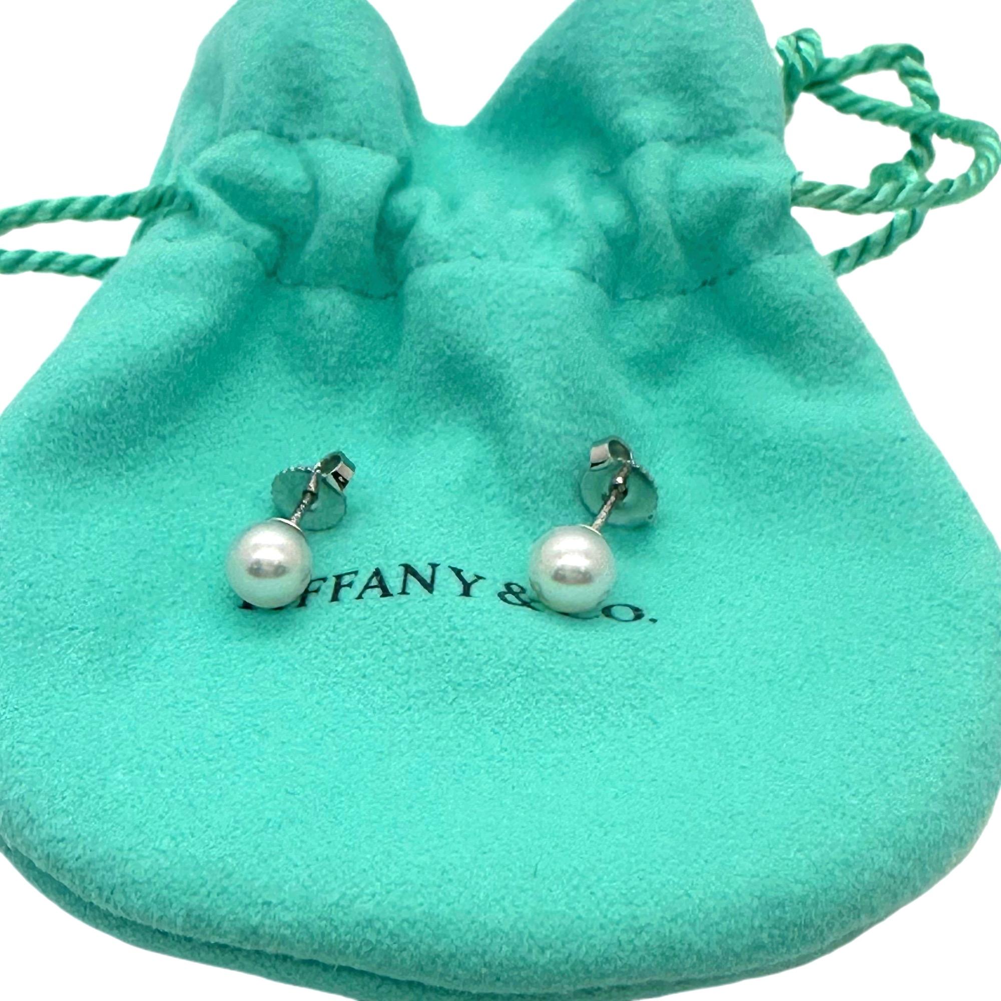 Tiffany & Co. Signature Pearls Stud Earrings
Style:  Stud for Pierced Ears
Ref. number:  60124079
Metal: 18k White Gold - Rhodium Plated to maintain Brilliance
Size:  6 - 6.5 mm
Hallmark:  ©T&Co. Au750
Includes:  T&C Jewelry Pouch & Outer