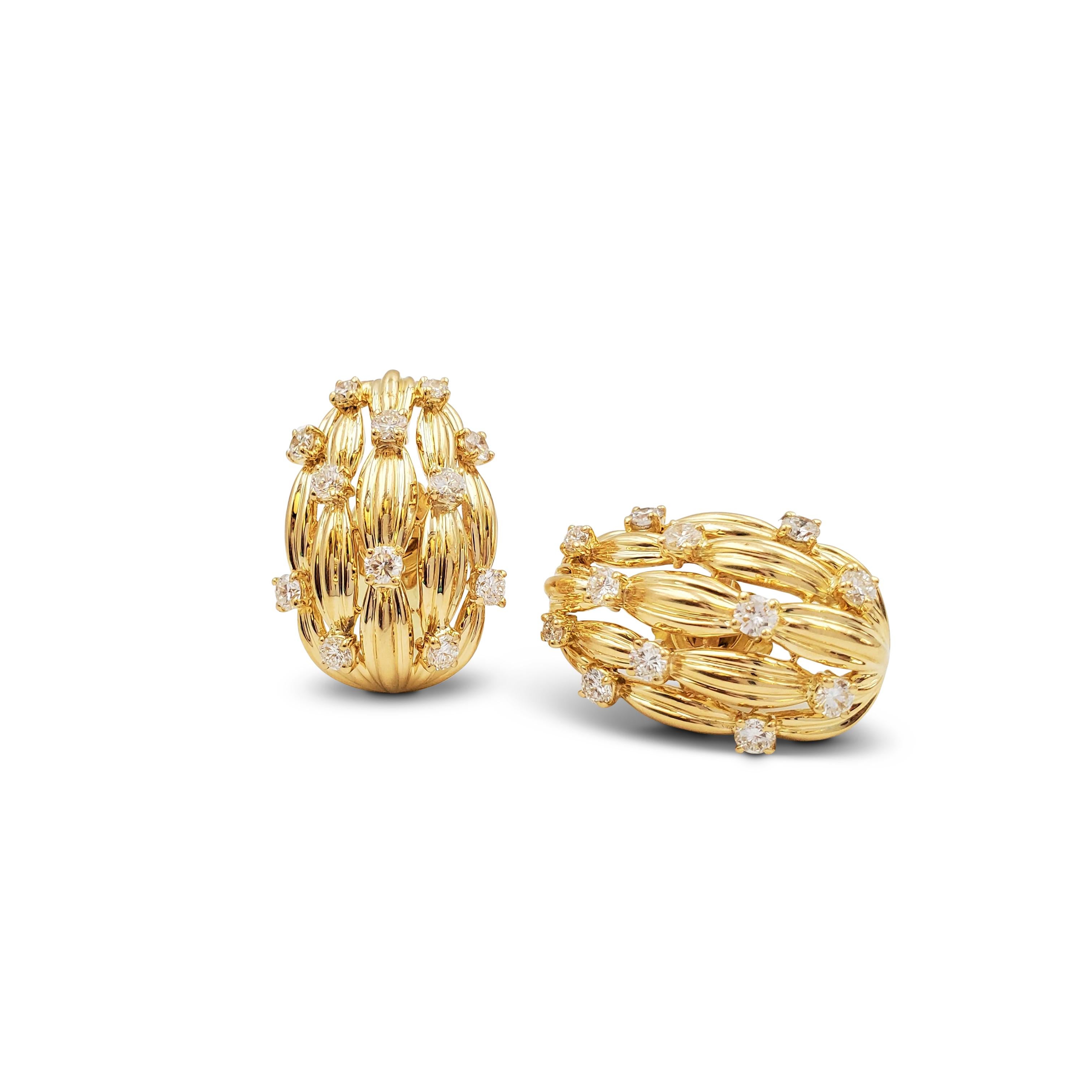 Authentic classic pair of 18 karat yellow gold and diamond earrings from the 