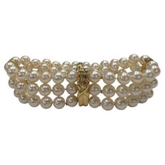 Tiffany & Co. Bracciale a tre fili con perle Akoya Signature X in oro giallo 18 carati
