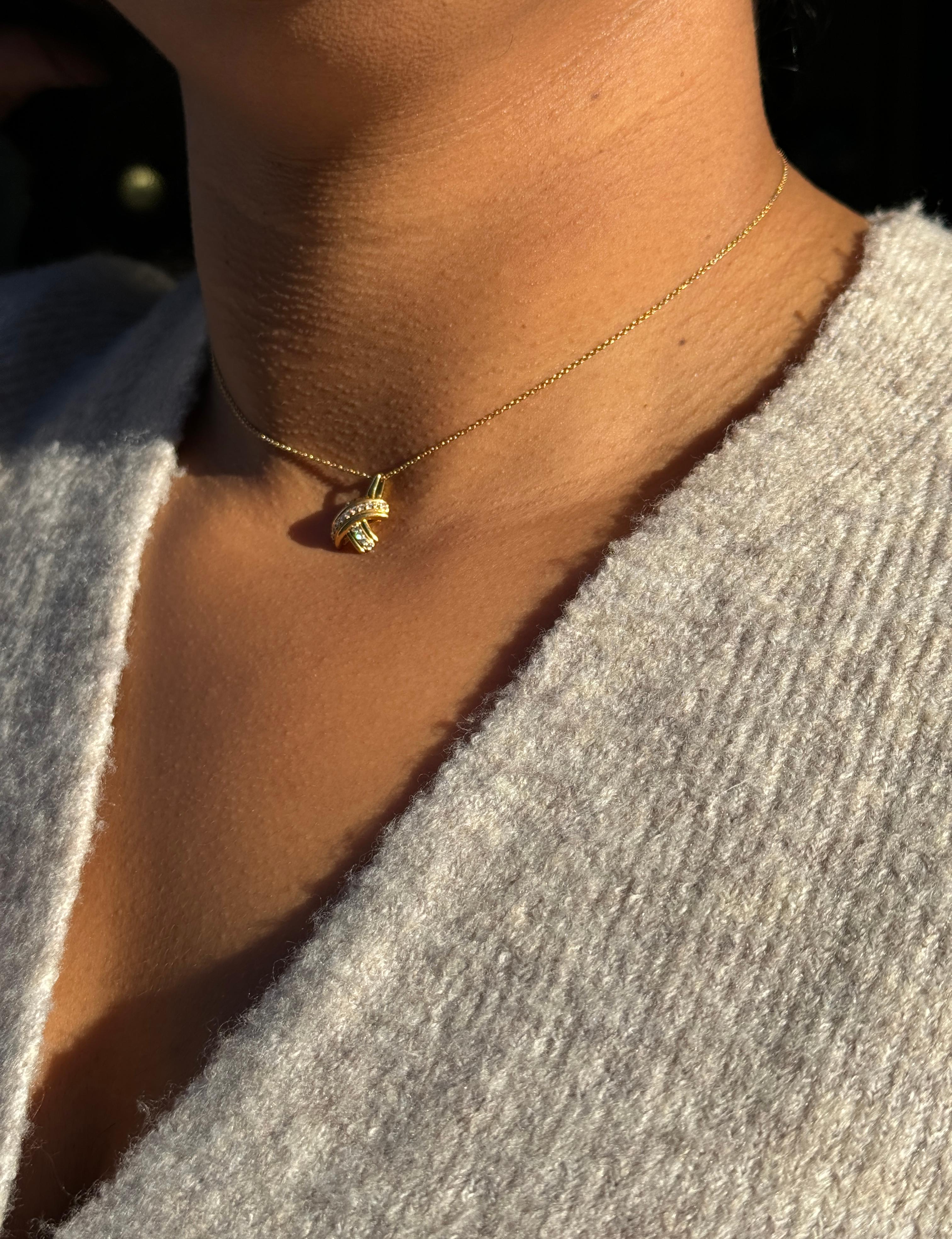 Tiffany & Co. Signature X Diamond & 18 Carat Yellow Gold 'Kiss' Pendant Necklace In Excellent Condition For Sale In London, GB