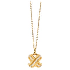 Tiffany & Co. Signature X Diamond & 18 Carat Yellow Gold 'Kiss' Pendant Necklace