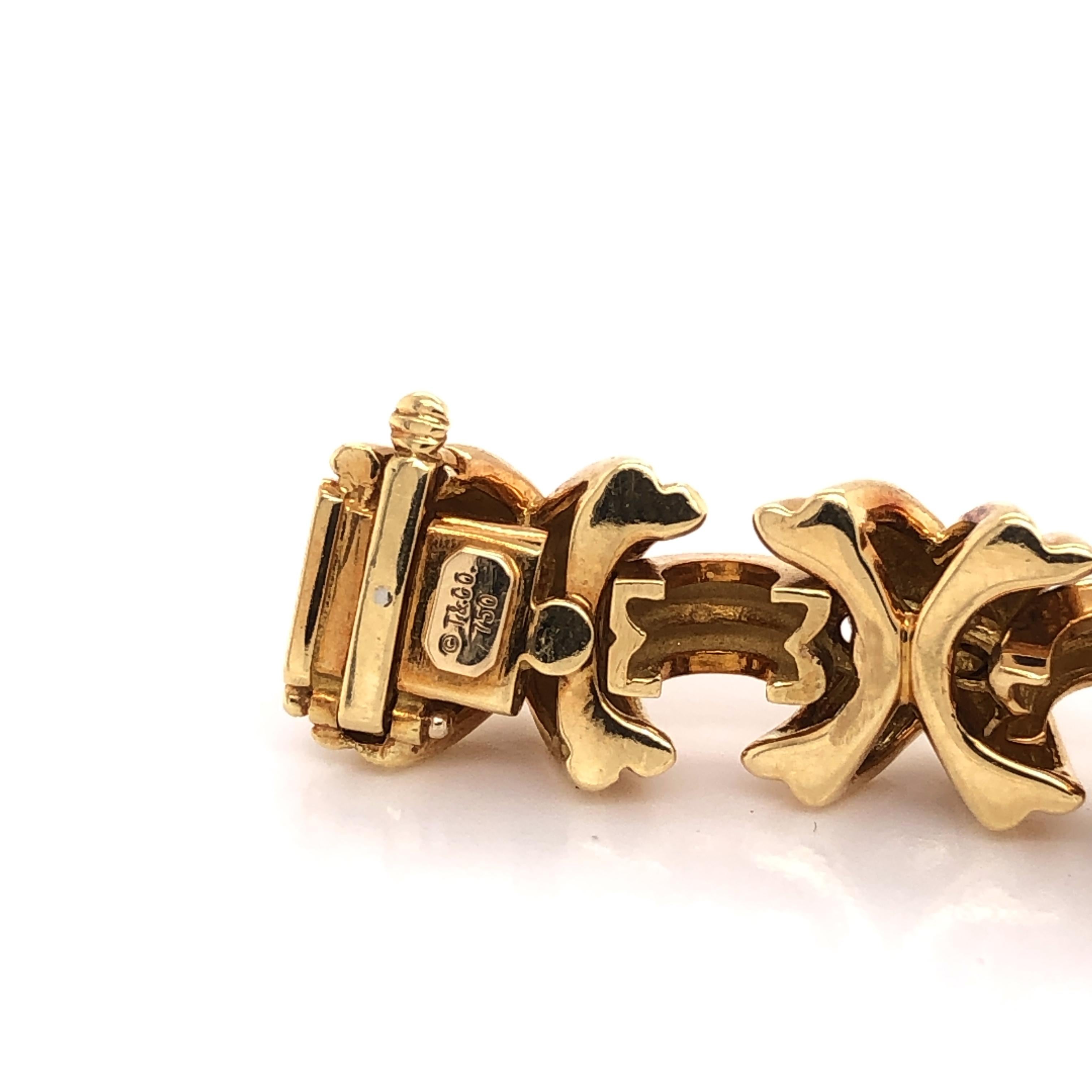 Tiffany & Co. Signatur X Diamant 18 Karat Gold-Armband im Zustand „Hervorragend“ in MIAMI, FL