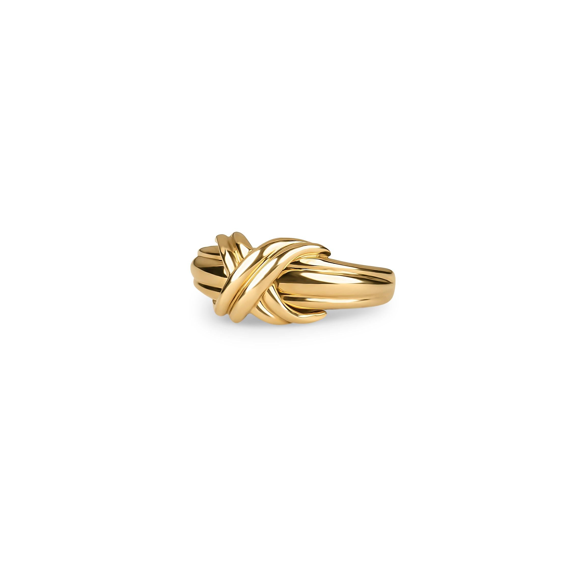 Tiffany &Co. Signature X ring in 18k yellow gold. Ring size 6
