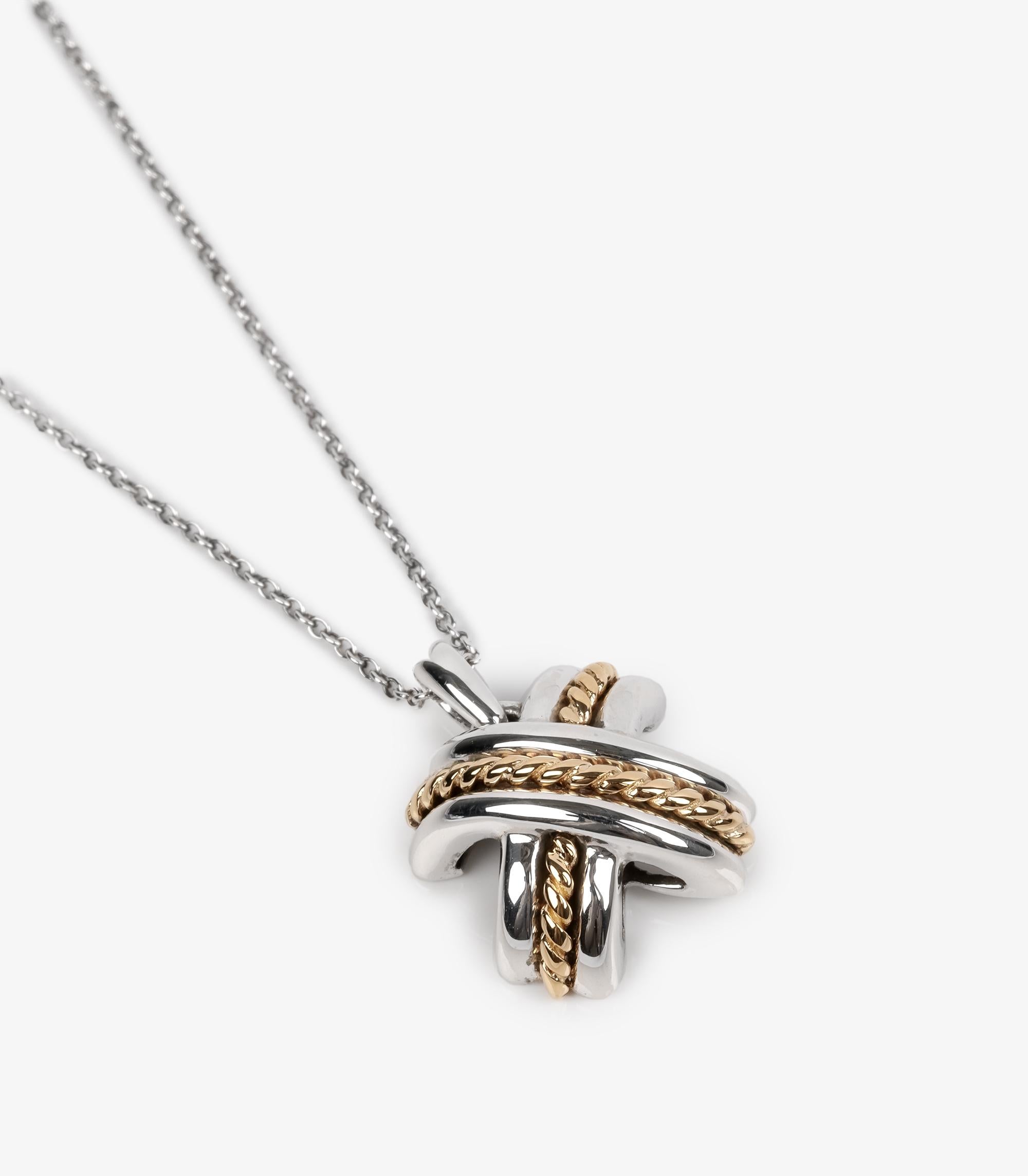 Tiffany & Co. Signature X Vintage Sterling Silver and 18ct Yellow Gold Necklace

Product Details
Xupes Ref: J1525
Brand: Tiffany & Co.
Model: Signature Bi-metal Pendant
Type: Necklace
Age: 1990
Material(s): Sterling Silver, 18ct Yellow