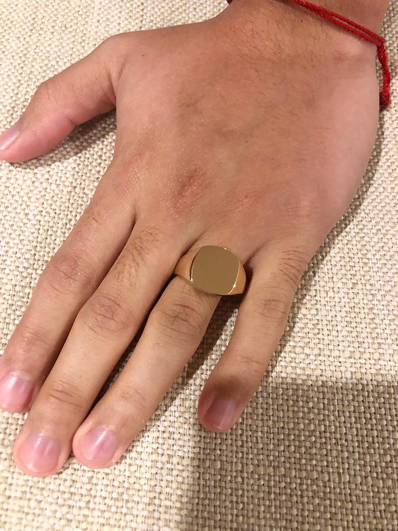 Classic signet ring.  Made and signed by TIFFANY & CO.  14K shiny yellow gold.   Size  10 1/4 and can be custom-sized.  Clean, sleek, moderne lines.

Alice Kwartler has sold the finest antique gold and diamond jewelry and silver for over forty years.