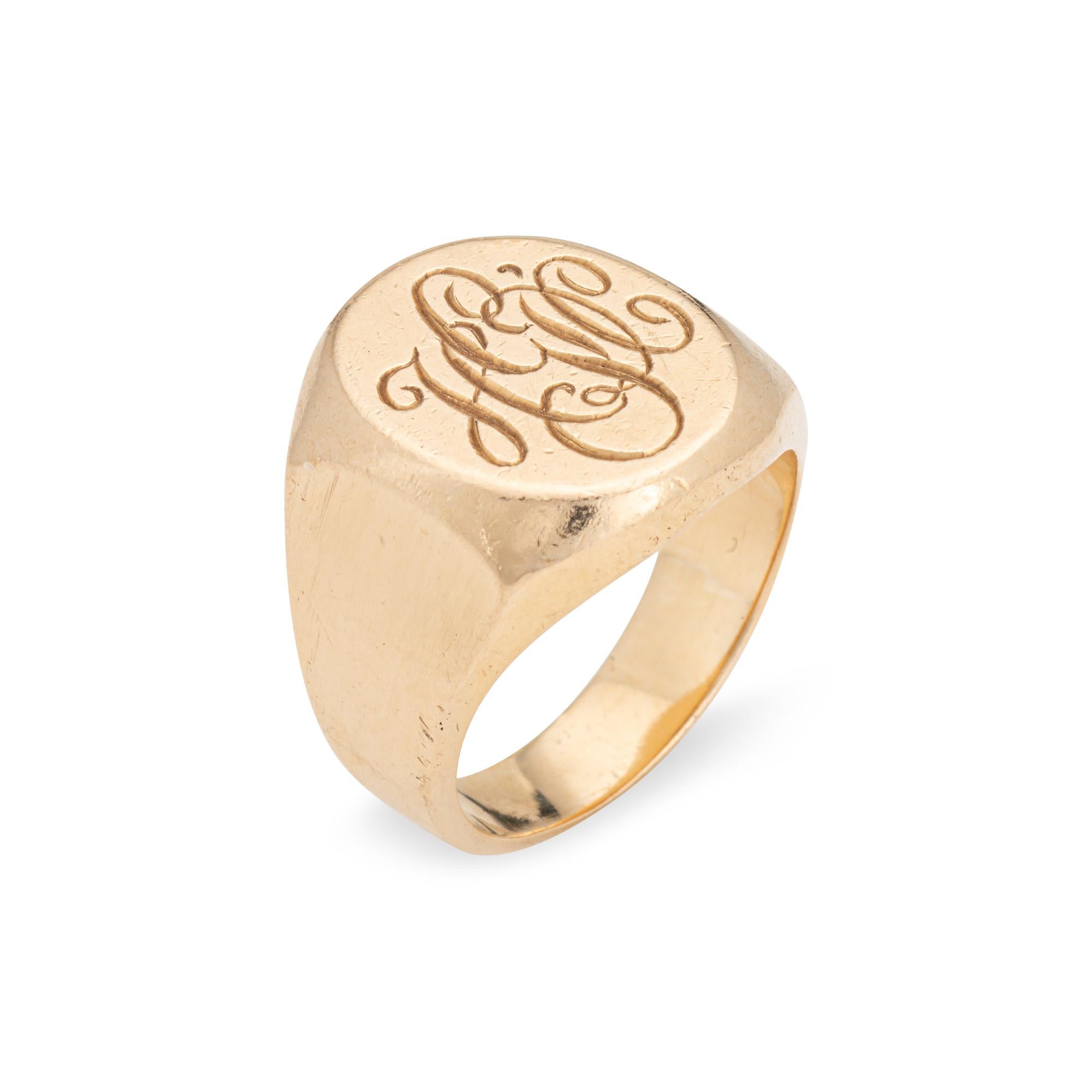 Finely detailed vintage Tiffany & Co signet ring crafted in 14k yellow gold (circa 1950s to 1960s). 

The vintage signet ring is engraved with the initials 