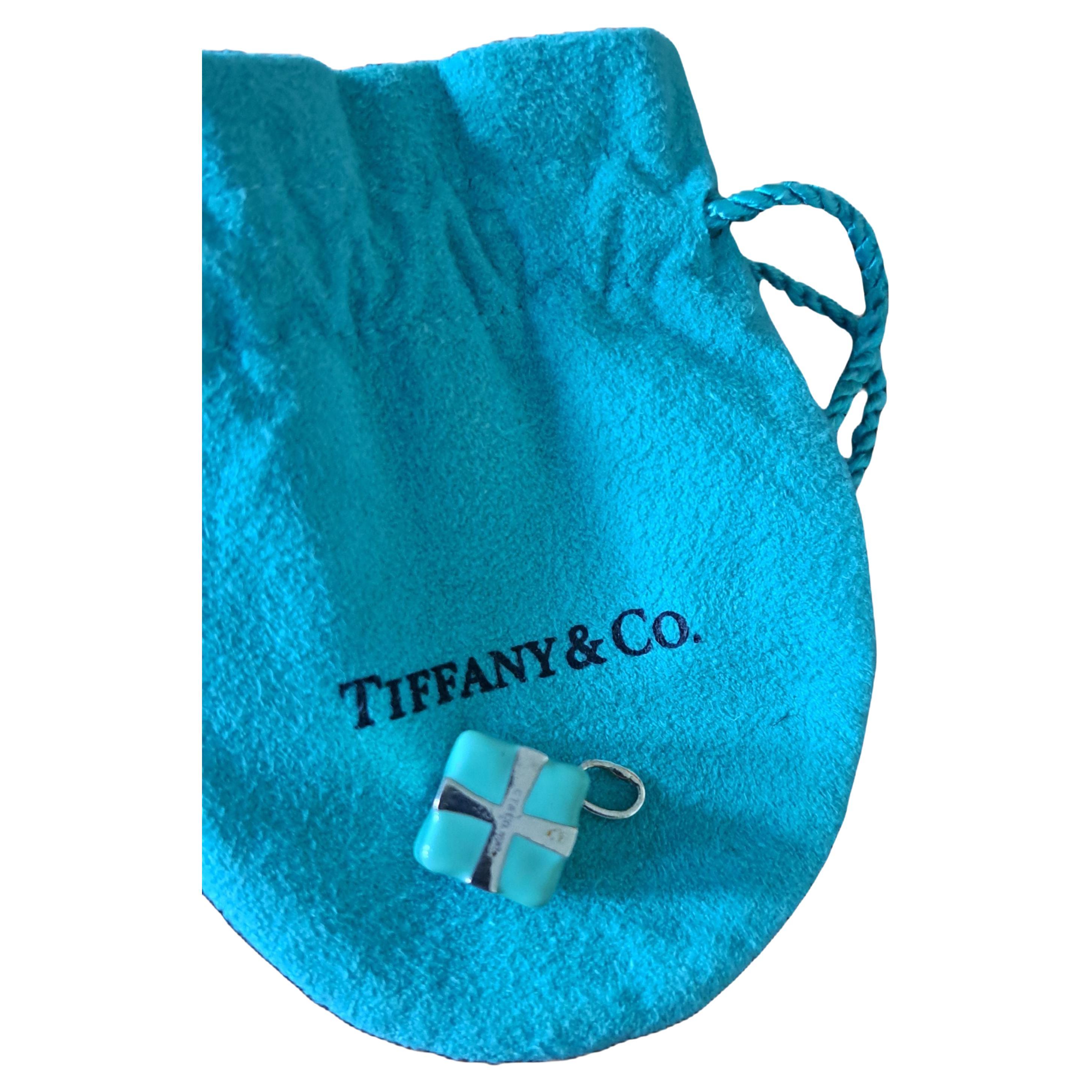 Tiffany & Co silver and turquoise blue enamel wrapped gift charm For Sale