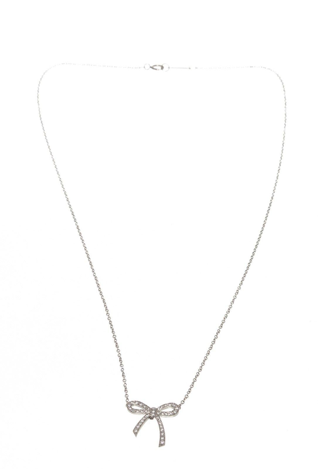 Tiffany & Co. Silver Bow Pendant Necklace with silver-tone hardware.

52969MSC  
