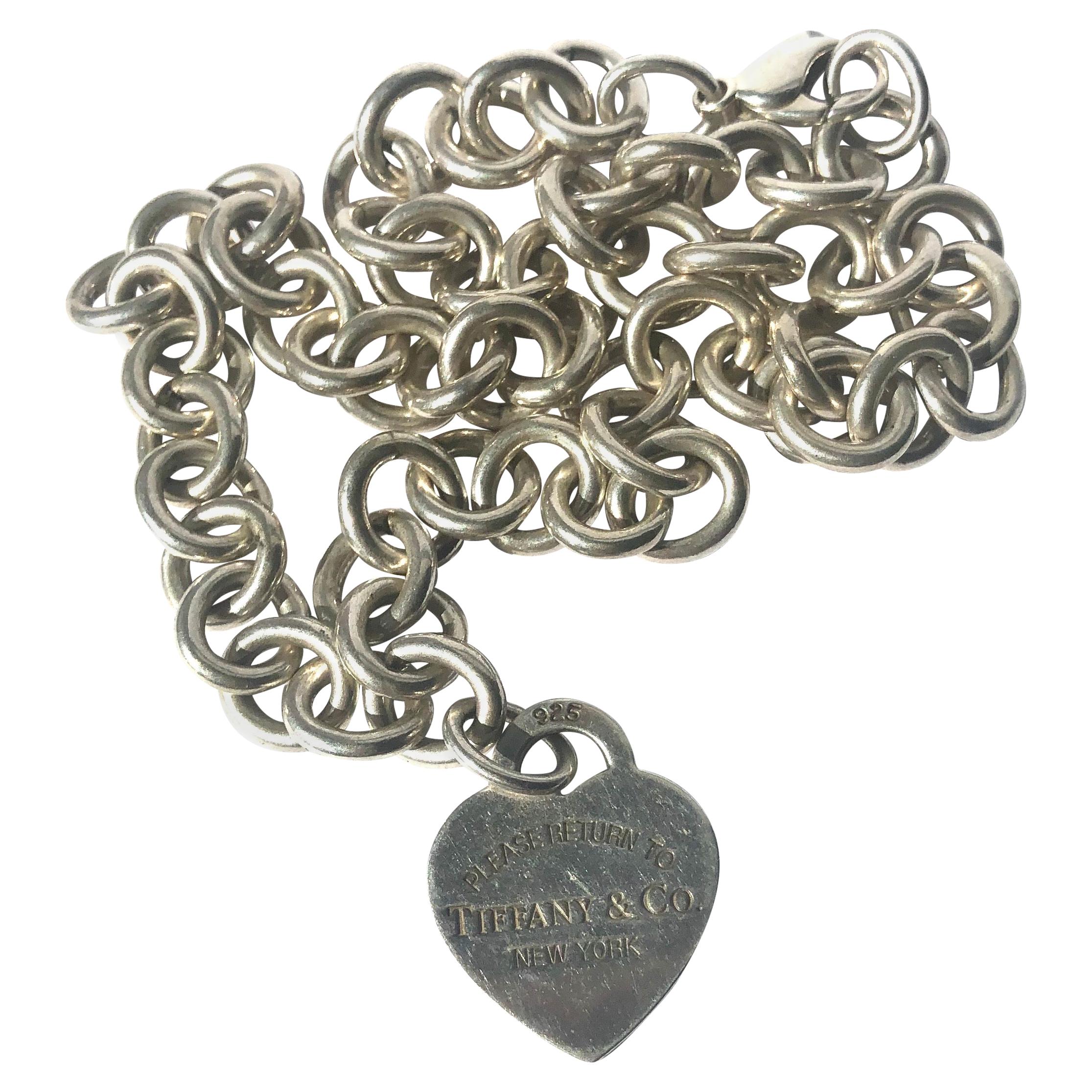 Tiffany and Co. Silver Charm Necklace at 1stDibs tiffany charm