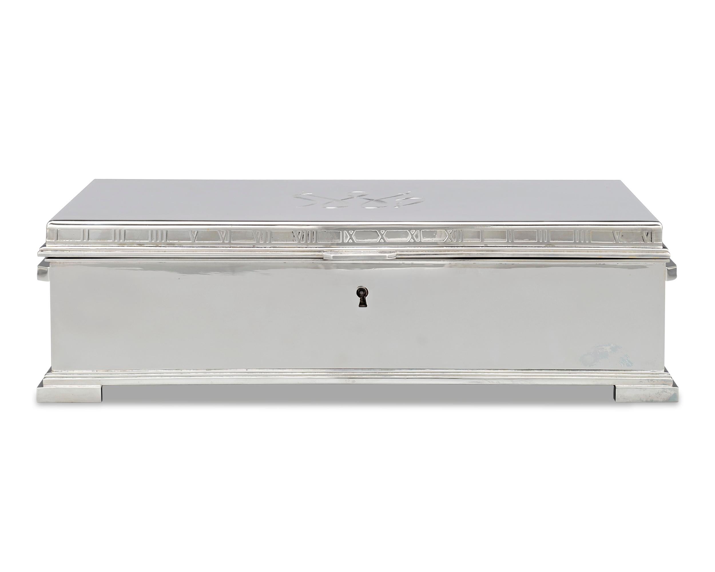Tiffany & Co. silver is renowned for its intrinsic sophistication and superior quality, and this sterling silver document box is no exception. Its straightforward design is adorned with a Roman numeral motif along the rim and supported by bracket