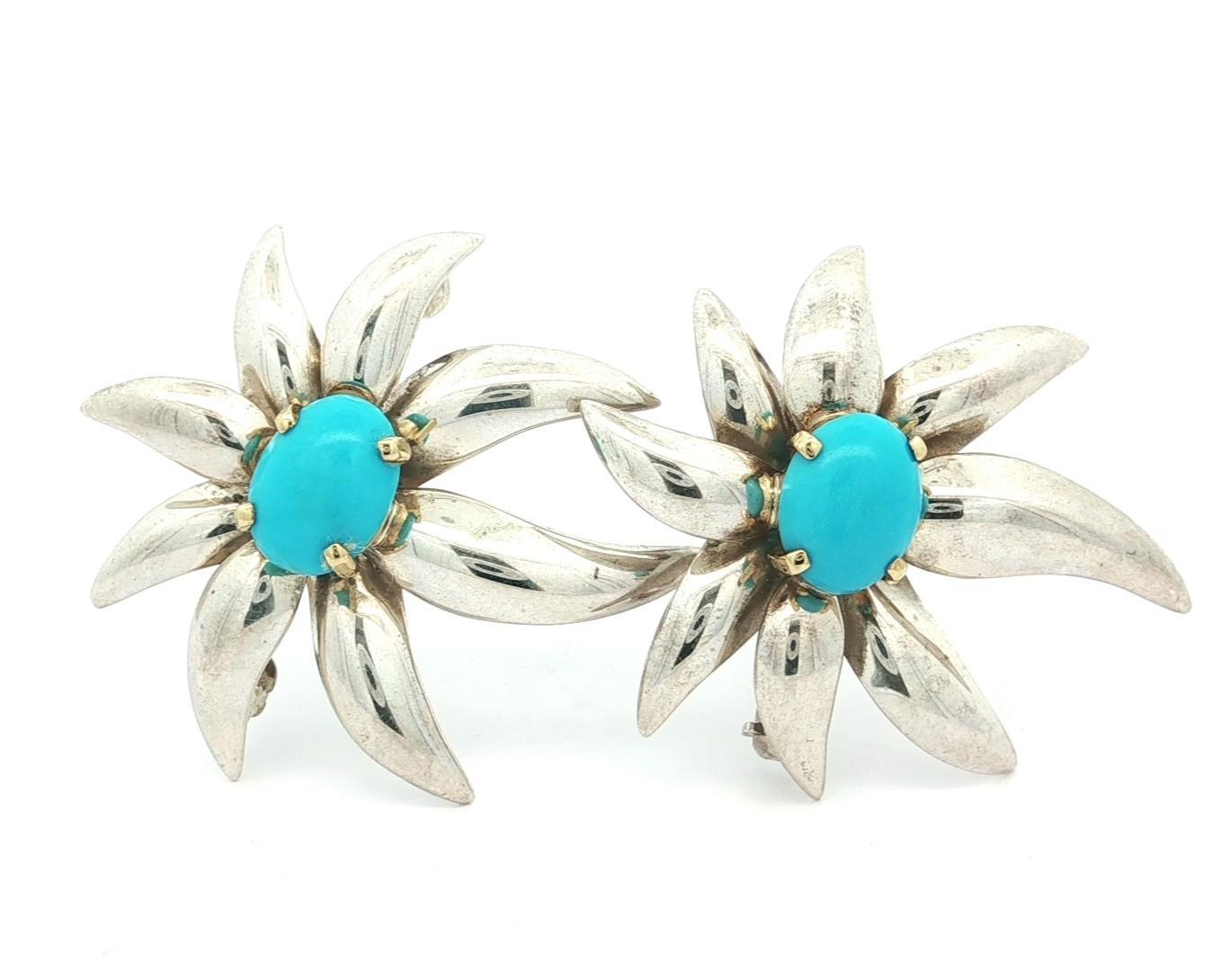 Tiffany
Co. Spilla in argento e oro con cabochon turchese Coppia di 2 fuochi d
artificio