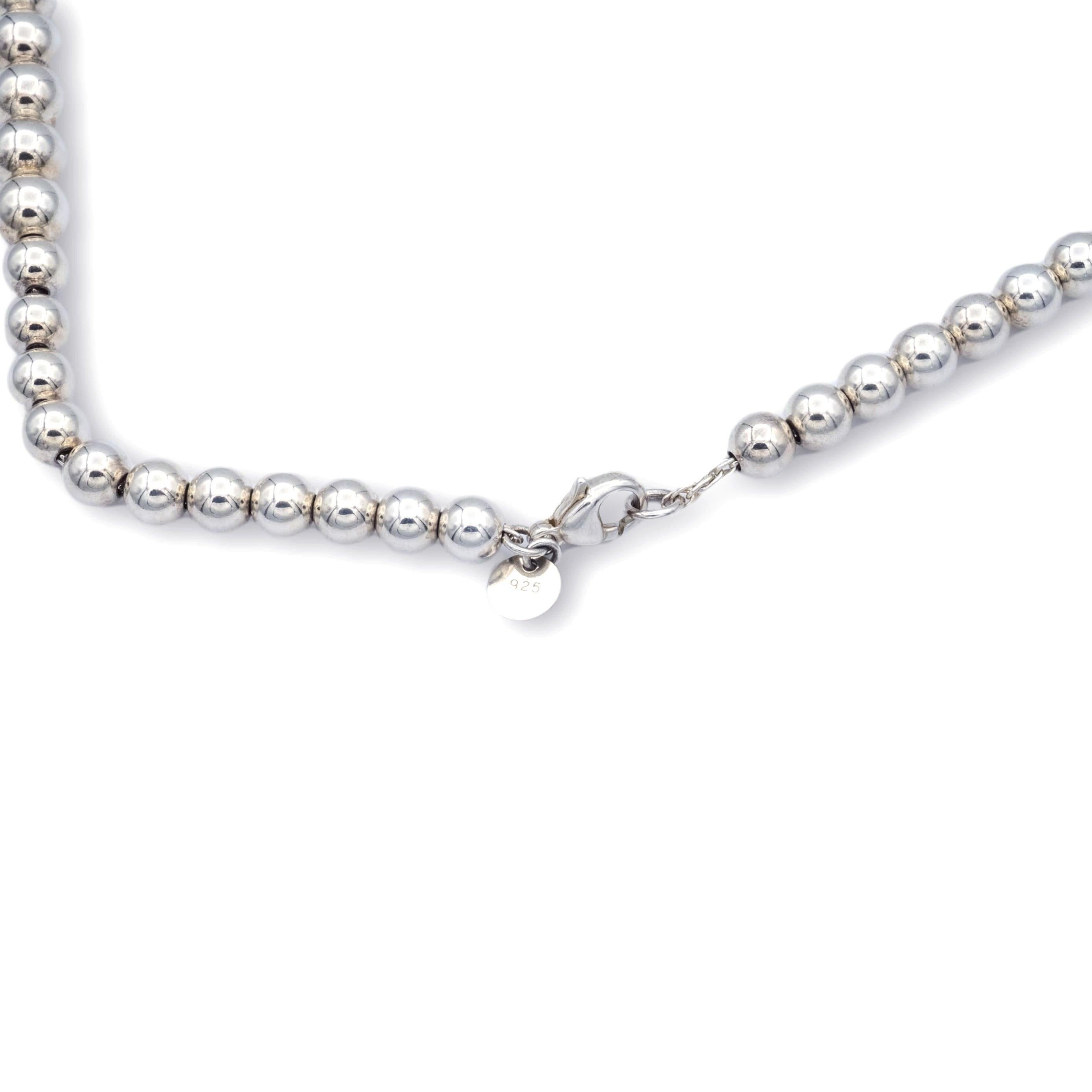 Tiffany & Co. necklace from the Hardware collection finely crafted in fine sterling silver with with 11mm balls at the front graduating to 6 mm balls at the back. Large lobster claw clasp.from925

Necklace Specifications

Brand: Tiffany &